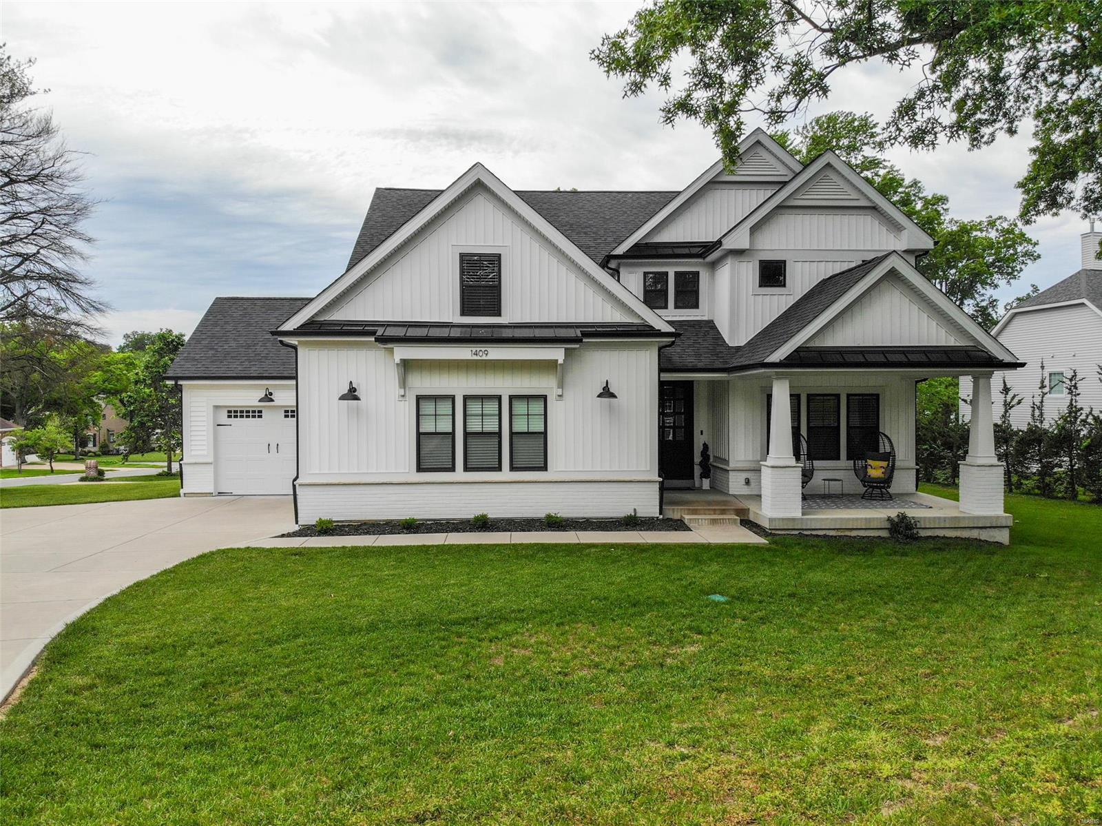 Fall in love with this stunning 5 bed, 4.5 bath modern farmhouse w/ 3-car garage nestled in the heart of Des Peres! Beautiful entry foyer greets you as you enter w/ hardwood floors & french doors that lead to a private office. MF boasts an open floor plan where the kitchen, dining and great room flow seamlessly. Gourmet kitchen has large island, breakfast bar, custom cabinetry, quartz counters, SS appliances, walk-in pantry, and wine bar w/ wine cooler. Add’l features on MF include beamed ceiling in great room, MF laundry, mudroom, and sliding glass door that opens to screened in composite deck. MF master suite has coffered ceilings, walk-in closet, dual vanity w/ granite counters, separate tub and walk-in shower. Second level has 3 bedrooms w/ walk-in closets, 2 full baths, and large bonus play room. LL features add'l bed and full bath, large rec room, ample storage & sauna that stays! There is room for a 600-700 sq ft pool, we can provide the layout as designed by Oasis Pools.