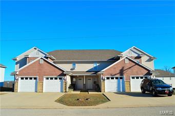 Built in 2007, these well maintained four plex town homes are one of the most popular rentals in the area. Conveniently located less than 10 minutes away from the main gate of Fort Leonard Wood and is also in the Waynesville School District. Each building consists of two outer units that are 3 bedroom 2.5 baths and two inner units that are 2 bedroom 2.5 baths. Each unit also features a 1 car garage. The lower level features a large living room with a half bath for guests, and a spacious kitchen with a generous amount of cabinet and counter space and convenient vinyl flooring for easy clean up! The dining area offers access to the patio and rear yard with matching partitions for added privacy. The upper level offers spacious bedrooms that are carpeted for comfort, 2 baths with vinyl flooring and a large laundry closet in the hall. These units are priced to sell and the Seller also has each building listed individually! Call your Agent today for more information!