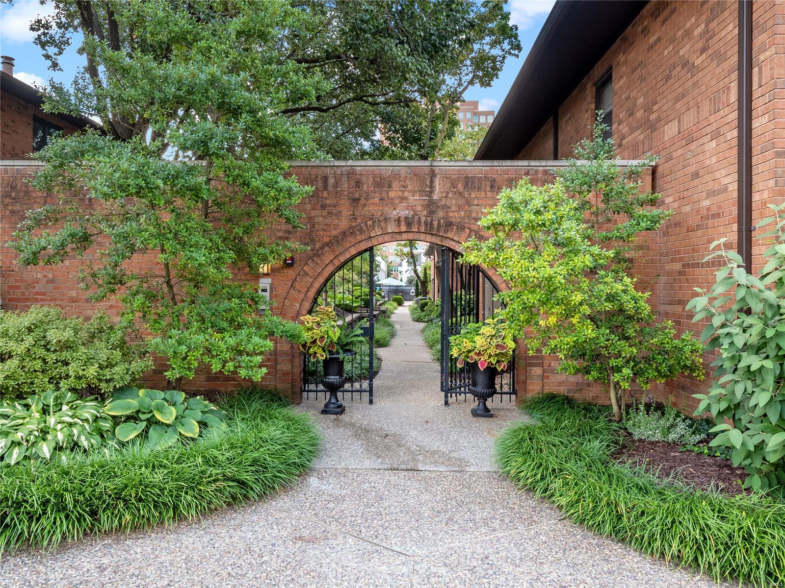 Looking for a home with an indoor and outdoor connection, easy walkability to restaurants, parks, library, award-winning schools, and all that Clayton offers? This townhome functions like a single-family residence with its expansive deck, 4 assigned parking spaces in the shared garage, and fantastic entertaining area... Sellers have had parties for 100+ people in the expansive indoor living area and outdoor deck overlooking the pool. With a turn of your key, take off on a last-minute vacay or visit family OOT. This townhome is truly turnkey. Enjoy a lifestyle that is full and fulfilling. Inside the spacious main level, abundant natural light creates a warm and inviting space to welcome your best pals. The primary bedroom has an office and a sitting area to read a book or watch a favorite show. The ensuite bathroom is luxurious and spa-like. 2 additional bedrooms and a laundry room complete the 2nd level. This is NOT the place if you need 1-level living; there is NO elevator. Location: Interior Unit
