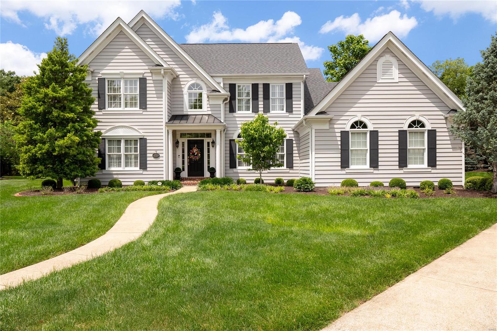 It's not often you find a home so beautifully loved & cared for but 878 Craig Forest Lane is that home!  From the moment you step inside, you feel pride of ownership in each living space. The foyer is gracious & welcoming. Enjoy the large sunlit family room with gas fireplace, built in bookcases & a wall of windows. Continue into the spacious white kitchen with Carrara marble counters, an ample center island with solid walnut top, pantry & built in side buffet cabinet. The breakfast room & welcoming hearth room complete the first floor. Laundry room is adjacent to breakfast room on main living level. Upstairs you'll find a gorgeous primary suite with vaulted ceiling, large windows, ceiling fan & walk in closet. The primary bath is the ultimate space to enjoy a steamy bath or shower & pamper yourself. Carrara marble tile floor enhances the stunning all white space. 3 more bedrooms are ample sized with ceiling fans & large closets. Partially finished lower. Walk to Robinson Elementary!