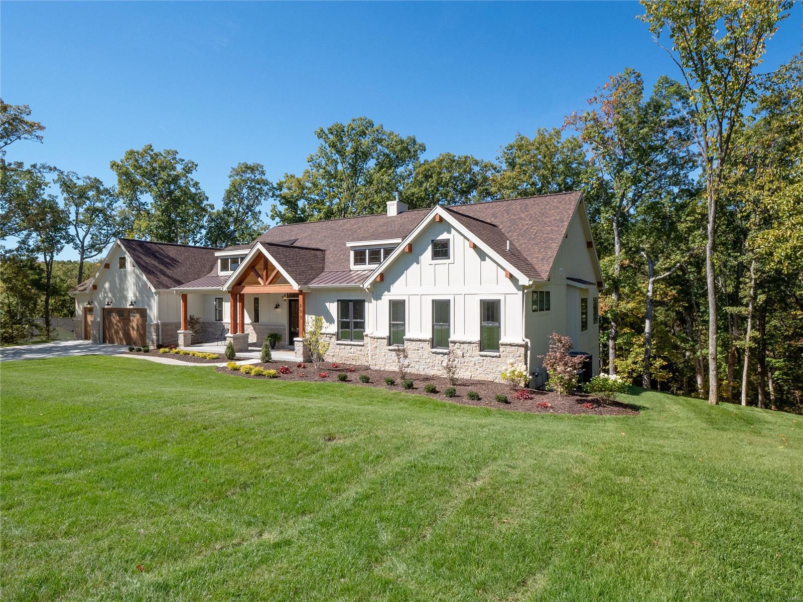 BAM! Yes that was the sound of your jaw hitting the floor.  This house is too good to be true and must be seen with your own eyes. Feel yourself totally relaxing on the drive up to your new home nestled into 2.58 acres of privacy. The dramatic great room envelops all who enter with its graciousness, comfort, and awe-inspiring elements; a custom stone fireplace, the solid Douglas fir beams, light infused windows and doors, and expansive open floor plan.  Start the day with coffee on the screened-in porch or at the masterfully crafted center island. When the 2 and 4 legged kids come in from playing, the mud room is the perfect place to wash off dirty feet or stow backpacks. Dining and entertaining are a total pleasure with the chef’s kitchen and walk-in pantry. When sleep calls at the end of the day, the primary ensuite rivals the best luxury hotel suite. The lower level is waiting for personal touches to call it your own w/2 bedrooms, tons of additional finished space and outdoor patio. Additional Rooms: Mud Room