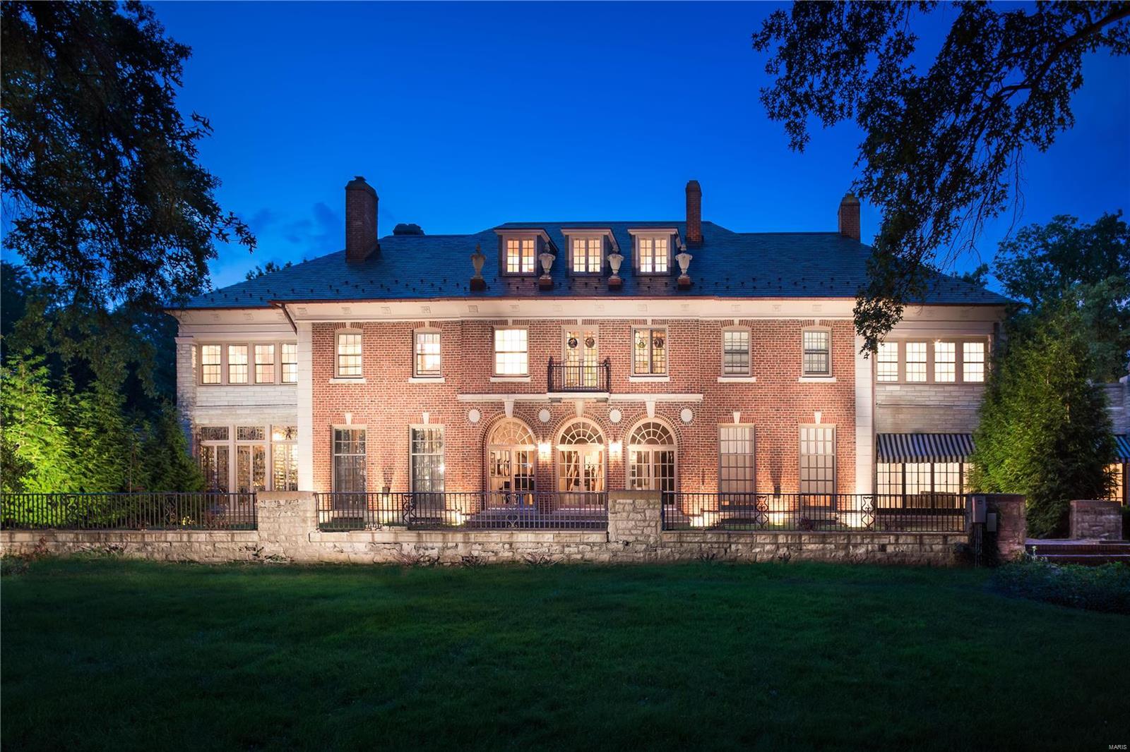 Major price reduction creates the very best value in a luxury Brentmoor Park Manse. Built in 1912, current owners purchased the residence in 2014 and undertook massive renovations bringing a vision with every modern convenience and luxury appointment, and a functional age of only 3 years old. The project was undertaken by Higginbotham, with an excess of $2.0 Million dollars invested, transforming the elegant estate into an all-new residence, thoughtfully preserving key historic touches. Finest upgrades and finishes  detail every rooms. The Master Suite is magnificent, with luxe baths and dual closets. The chef's kitchen is one of the very best in all St. Louis. Plumbing, wiring, electrical, heating and cooling systems are new. 18 zone audio video automation system runs the property developed by Eco High Fidelity and Fusion Media. Graceful patios, terraces and landscaping complete the property. Four bedrooms, seven baths. 10,000 square foot home on 1.7 acre parcel.