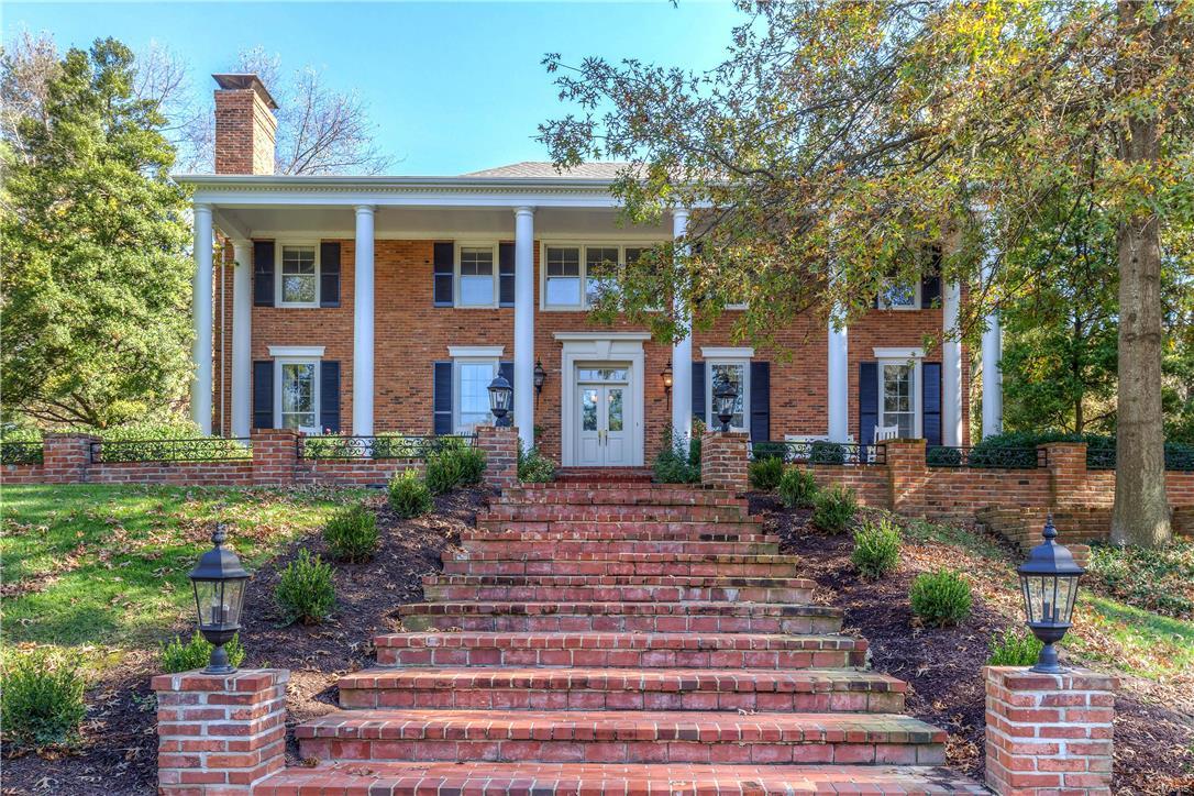 A true love story. This generous family home sits on nearly 2 acres overlooking The Bogey Club. From the moment you drive up the beautifully landscaped circular drive, you are in awe of this stately manse. The timeless interior offers the best of classic design and modern convenience. You will host the most talked about parties in the formal living and dining rooms, while the professionally remodeled kitchen with custom cabinetry, rare granite countertops, and chef-quality Wolf appliances will be the epicenter of your daily life. French doors off the adjoining hearth room open to the enormous blue stone patio to allow kids and dogs to run in and out. You'll relax at the end of the day, thankful for a life well lived in this home. The spacious rooms and open floor plan offer a variety of lifestyle and generational options, with 1st and 2nd floor master suites, direct access baths for all additional bedrooms, and a huge bonus space over the 4 car garage with its own separate entrance.