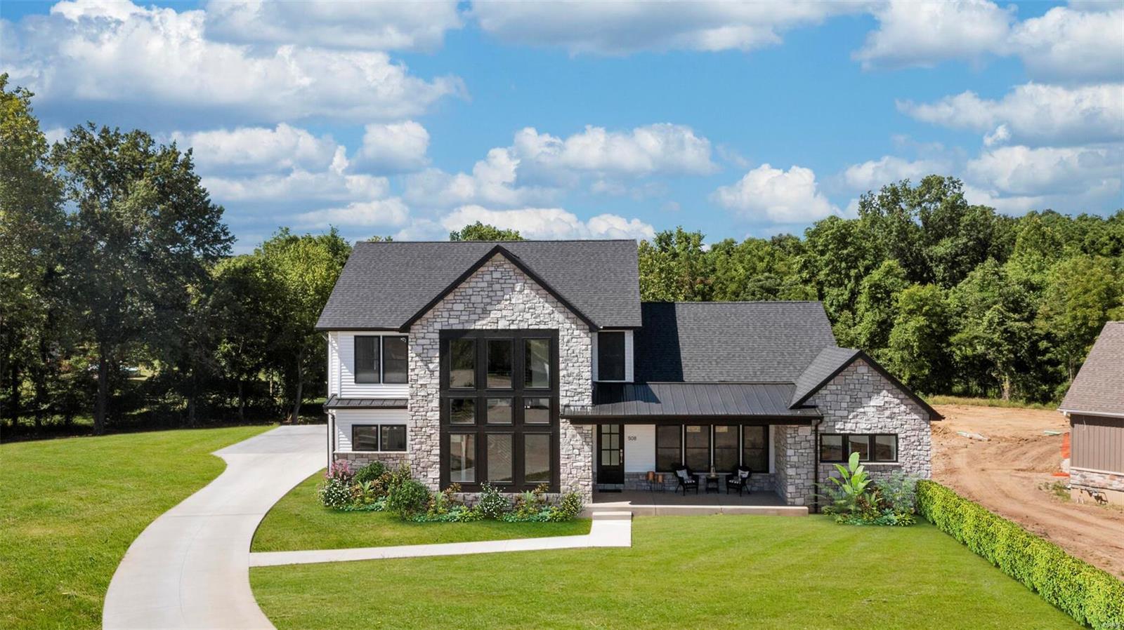 ALMOST DONE! Move-in ready in less than 2 weeks! You need to see the luxury & quality in this thoughtfully designed & meticulously built, 5000 sq ft, 5 Bed/4.5 Bath custom modern farmhouse! When you walk in surrounded by sunlight & luxurious fixtures, you will feel right at home. Cozy up in the Great Room w/ floor to ceiling stone fireplace & watch deer play in your huge private backyard. Check out the feature Window Wall showcasing one of a kind staircase. Gourmet Kitchen with quartz countertops, Thomasville cabinets, & State-of-the-Art SS appliance package; Bonus pot filler over the 5 Burner Range & hidden walk-in pantry. Split floor plan offers privacy for Main Floor Master Suite w/ its free standing tub, double sinks, & walk-in closet. Main Floor Laundry & MudRoom w/ access to 24 ft deep 3-car side entry garage w/ 8ft high extra wide doors. Finished LL w/ 5th Bed plus Bath & Rec Room. Smart Home Technology throughout. Beat the bidding wars & make this your new home today! Additional Rooms: Mud Room