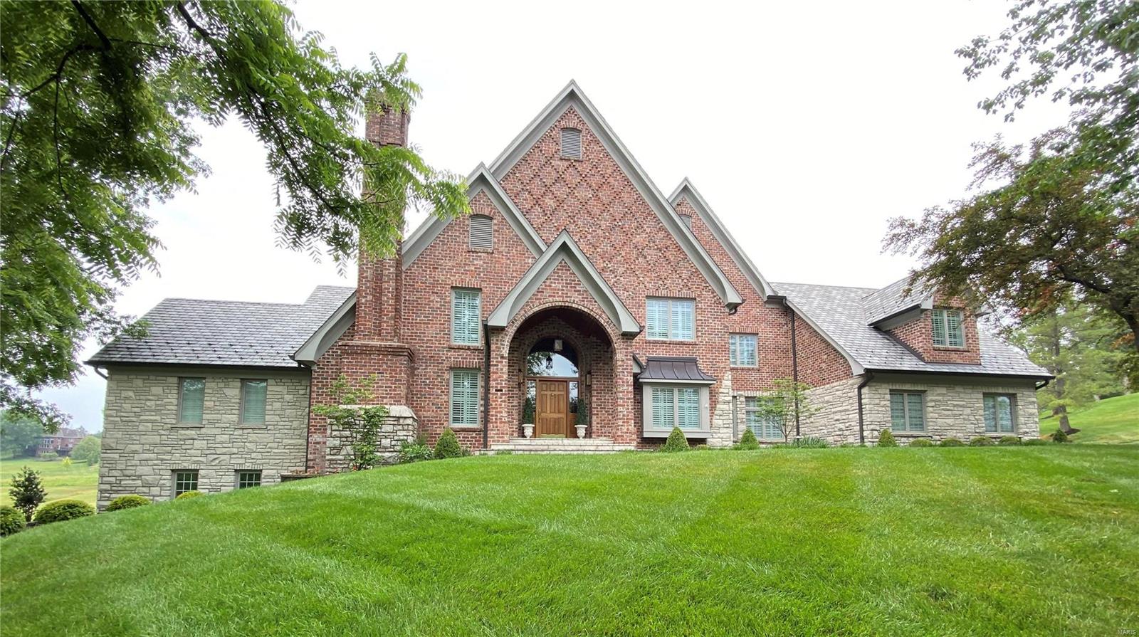 This stunning home won an International award for excellence in masonry. Masterfully built & perfectly set on a homesite w/spectacular views of the golf course from its raised private stone balcony off primary bedroom, lower level & front door. Views are second to none in all of St. Albans. The upgrades & attention to detail by current owner have made this amazing home even more perfect. A complete list of improvements is available, but examples include: Complete remodel of primary bath, Walk-in closet w/custom built-in shelving units, All kitchen appliances upgraded to Viking plus new granite countertops, New carpet & pad throughout, Fireplace flues restored w/gas logs + custom screens, All new landscaping w/sprinklers & exterior lighting, Garage epoxy floor & heater, All new laundry cabinets, Window tinting, Plantation shutters, Window shades, Upgraded chandeliers, light fixtures & wall sconces, Completely repainted interior, Refinished front door & painted all exterior windows.
