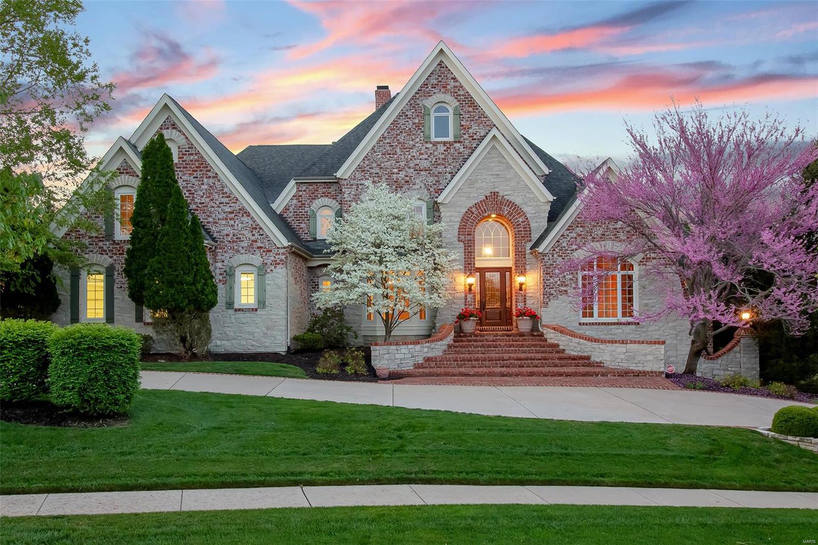 If you know Greystone, then you know THE HOUSE! Finally your opportunity to live in this magnificent home.LIKE BEING ON VACATION EVERY DAY. Situated on a spectacular landscaped lot with curb appeal that turns the head of every passer-by, even from the back! Inside find the same highest quality appointments & breathtaking beauty. Chef's kitchen w/sub zero, professional Viking S/S range with hood, Viking DW large island/brk bar, granite, and high end custom cab & hearth rm w/gas stone/brick see-thru frpl.Great room has wall of curved windows. Gorgeous mn floor Mstr. suite w/luxury bath. Hrdw flrs on main.All upstairs bdrms have private bath.2nd floor laundry.New carpet. incredible fin. LL w/high ceilings & large wall of curved windows. Bonus room perfect for theatre, wine cellar or gym. Deck overlooks a spectacular view. Free form inground pool w/waterfall. Screened in gazebo by pool with bath/changing room. 4 zones.newer roof. Spotless 0versized 3 car heated garage. Schierholz built!
