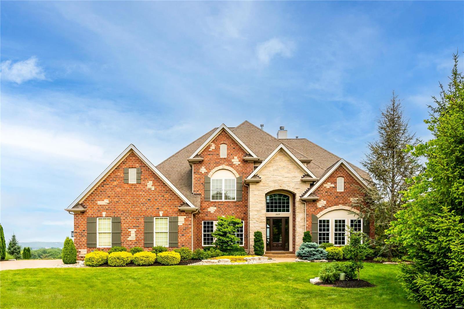 Situated on a cul-de-sac riverfront lot on the bluffs of the Mississippi this exquisite home offers ample space & privacy. It's a true masterpiece, offering luxury & elegance at every turn. It offers countless features & stunning finishes throughout. The grand foyer flows well into the great room/dining room & provides the perfect ambiance for entertaining along with the warm hearth room.  The breakfast room overlooks the magnificent back-yard & showcases the gorgeous SALTWATER POOL, the lush landscaping, and is the perfect oasis. Main flr laundry is a bonus, while the dual staircase provides easy access to the 2nd floor, which includes a loft, 3 spacious bedrooms and 2 full baths. The main flr suite is a true retreat, featuring layers of crown molding, a spa-like bath, & W/I closets.  The finished walk-out LL is designed for prestigious living with an incredible bar area & bedroom.  The outdoor space, and breathtaking views, highlight beautiful outdoor living. Prepare to fall in love. Additional Rooms: Mud Room