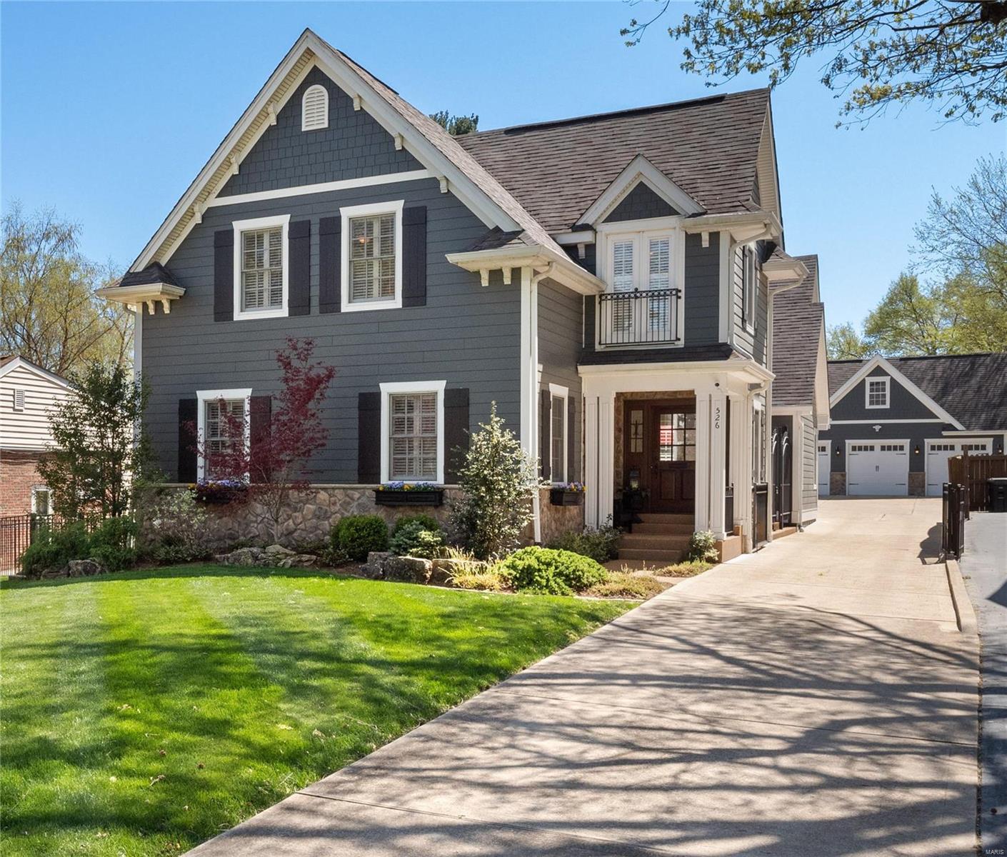 Want to be able to stroll into downtown Kirkwood? This is it! Every inch of this almost 4,200 sq ft, 12 year new, meticulously maintained masterpiece, upgraded w/James Hardie siding & stonework, has the wow factor! Once inside, you will be struck by the pristine condition & the exquisite millwork throughout the open floor plan. The Great Rm boasts of a 12' ceiling w/2 step tray w/box beams plus French doors leading to a private gated courtyard & adjoins the 11' ceiling DR w/equally impressive millwork. Beyond the DR find a gourmet kitchen w/large center island & high end appliances. The owners have upgraded this home w/a hearth rm & laundry rm addition which seamlessly flows from the kitchen. A spacious master w/updated en-suite bath, Two add bedrms & full bath complete the main floor. Upstairs find 2 bedrms & a full bath. The deep pour LL, w/same quality finishes, offers a huge family rm, rec rm & full bath. Very deep fenced lot w/3 car garage w/rough-in for finish above! A must see!