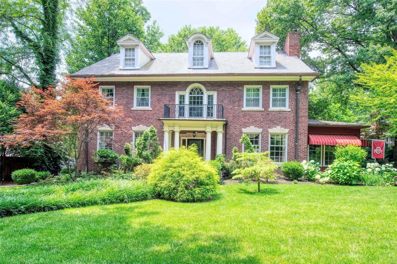*JUST REDUCED* Exquisite Home in the sought-after Polo Neighborhood of Downtown Clayton! A lovely 2.5 Story Home with 6 Bedrooms, 6 Baths, and over 4,000 square feet of finished living area. Features include stunning Entry Foyer with Beautiful Staircase,  Formal Living Room and Dining Room with fireplaces, and Glassed-in Porch. The Gourmet Kitchen has been Remodeled with Granite Counters, top-of the line stainless steel appliances and Sub-Zero refrigerator. Gleaming Hardwood floors and custom mill work on 1st and 2nd floors. Master bedroom with fireplace and a beautiful luxury Master Bath. 3 additional bedrooms and 2 updated baths complete the second floor.  The 3rd floor is a perfect getaway for guests or family with 2 Bedrooms and Full bath. The lower level is nicely finished with Rec room, kitchenette, utility room, and updated half bath. Beautiful deck and paver patio, level backyard, newer landscaping with garden house for additional storage.  This is Truly A MUST SEE HOME!
