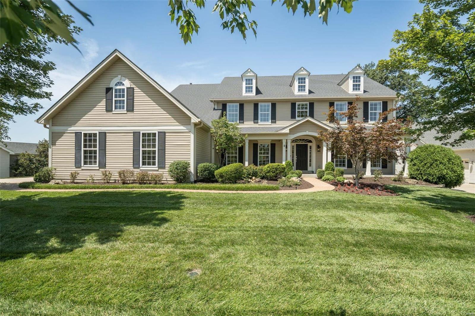 Meticulous 1.5 story. Quiet cul-de-sac. Lovely neighborhood. Exquisite attention to detail: wood floors, interesting ceilings, amazing moldings, lighting detail, the list goes on. GR has a large wall of windows flooding home w light. Gourmet kitchen: 42” cabinets; stainless appliances; Jenn-Air 6 burner gas cooktop + griddle, high power hood w warming lights, dbl ovens, warming drawer; focal contrasting island & granite counters & so much more. Enjoy second fpl in hearth room. Inviting 3 season rm w neat cathedral ceiling & 2 fans. Flow from there to lovely deck & fenced backyard. Walk-in custom pantry has washer & dryer hookup option. Customized mud rm w cubbies. Luxury master bath. Upstairs: flexible loft spaces w custom built-in desks & cabinets; FR space w large window seat; 2 bdrms share J/J bath; guest suite w bath; Laundry rm. Must see LL w rec area, media area, entertaining bar, 5th bdrm now being used as gym & full bath. Easy access highways, shopping, restaurants & park. Additional Rooms: Mud Room, Sun Room