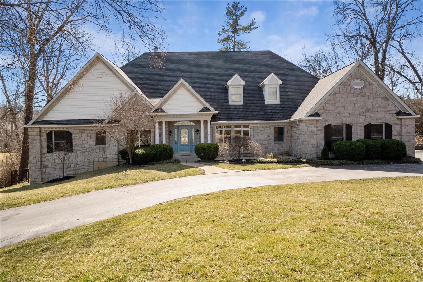 Open House 3/14 1-3 pm. Striking atrium ranch nestled in one of Ladue area’s finest lanes. The skyscraping ceilings and windows liven the senses.  Peruse vintage wines in your walk-in wine cooler or have a hot steam in the oversized shower, the creature comforts this home affords are extensive.  The open floor plan features a gourmet kitchen with Viking appliances, a massive island, and eating area.  Dimmable lights, 3 gas fireplaces, and surround sound keeps the evening mood ambient.  The sleek greyish bamboo floors enhance the soaring wall height and natural light that pours in daily via southern exposure.  The main bedroom is a sanctuary with his and her’s walk-ins, a private deck, spa-like bath, and fireplace.  The above grade finished basement gives patrons a place to spread out and easily access the lush, private, fully fenced backyard.  Plenty of parking for big boy toys and guests on the circle drive, turning pad, and oversized 3 car garage.  Come live the good life. Additional Rooms: Wine Cellar