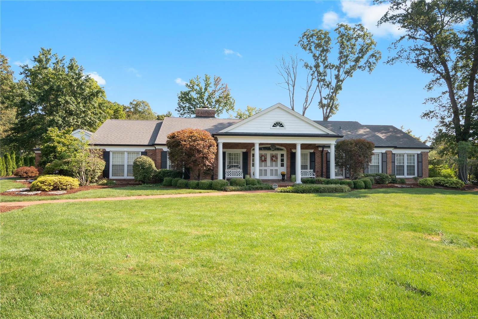 This 4BR home rests in a private estate in a leafy pocket of Ladue close to award-winning schools and all amenities. Thoughtfully designed, there’s abundant space inside and out. The 4000sqft+ interior oozes opulent country charm. The grand entry features hardwood floors and elegant trim work that extend into the formal living & dining areas. There’s a cozy hearth room with exposed timber beams and a stone fireplace. A gourmet kitchen boasts high-end appliances and a huge island bench. Slate floor, granite countertops and a masonry wall add to the classic country feel. To the rear is a light, bright sunroom overlooking a sparkling in-ground pool. Other highlights: 4.5 lavish bathrooms, roomy bedrooms. Downstairs is a vast, versatile space that includes state-of-the-art media room, gym and large play area/music zone. Outside, a 2-car garage, basketball ring, and custom-built BBQ are all housed on a landscaped 1-acre lot with luscious lawn Additional Rooms: Sun Room