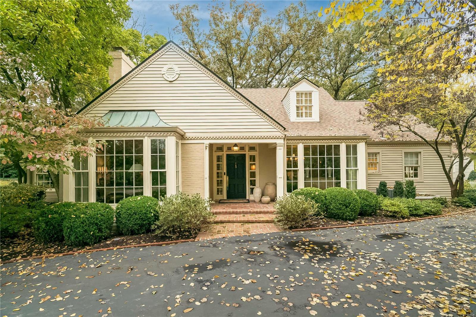 Welcome to 8 Wakefield Dr.! This elegant, story and a half home has been maintained with "kid gloves." This stunning home offers ample living space, eloquent entertaining spaces and private outdoor living. The open kitchen (stainless steal appliances, subzero refrigerator, beverage/wine fridge, granite tops, oversized island)  and hearth room are accompanied by a generous sized laundry room/office, that also triples as a butlers pantry close to the bright and large dining room. For your convenience, the primary suite is located on the main level with an adjacent sitting room (floor to sealing windows, heated floors and gas stove). 3 additional bedrooms and 2 full baths are located  on the second level with fantastic closet space and storage. Last but not least, the lower level is beautifully finished with luxury vinyl flooring for additional living space, gym space, or whatever your heart desires. Additional Rooms: Mud Room, Sun Room