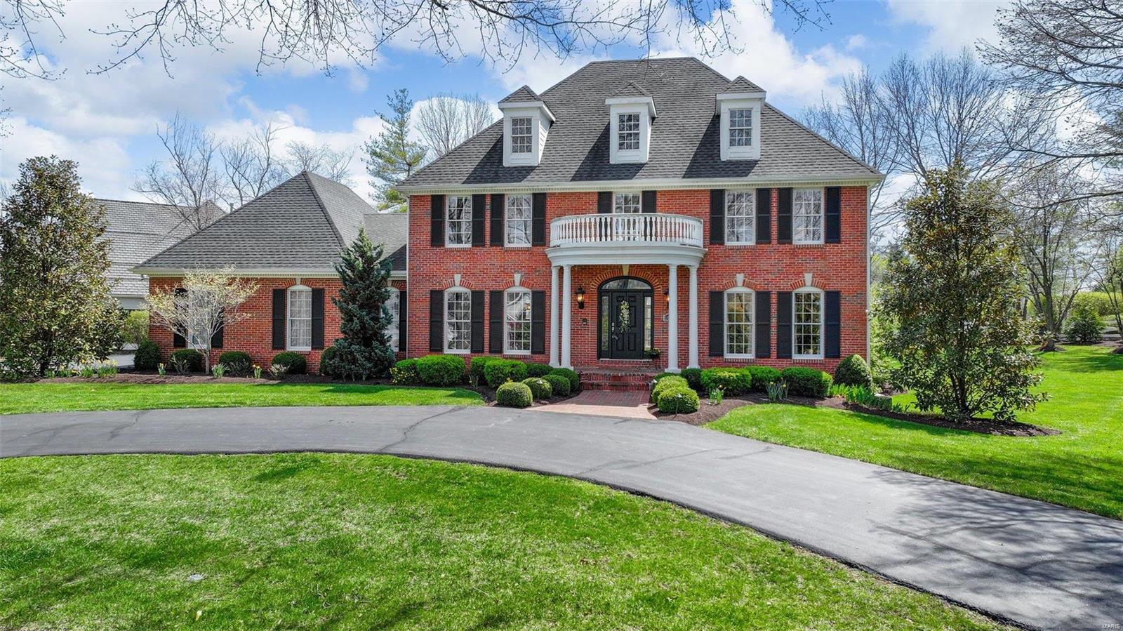 Gorgeous brick colonial on 1+ acre in sought-after Dunhill Farm. The 2-story foyer w/stunning staircase beckons you in to this elegant home. Enjoy a large dedicated office with box beam ceiling, built-ins & new french doors. Beautiful hardwood floors lead you into the family room w/gas fireplace, adjacent sitting room w/built-ins and copious amounts of light. Kitchen offers 42" cabinets, granite, stainless appliances & walk-in pantry, as well as a hearth room w/gas fireplace. New outdoor stone fireplace and patio offer a welcome respite on those chilly evenings. Four bedrooms and three full baths upstairs, including a huge master w/gas fireplace. Spa-like master bath features stand alone tub, sep. shower and dual sinks, plus walk-in closet. Professionally finished lower level offers additional living space, including a 1/2 bath, wet bar, sleeping/fitness room and lots of storage. Newer HVAC systems (2020), 2 hot water tanks (2023), new irrigation system, circle drive and so much more! Additional Rooms: Mud Room