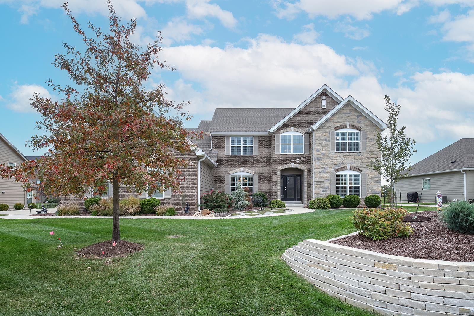 Stunning custom built 1.5-Story, situated on a level .36-acre lot! 4 Bed/3.5 Bath showplace has 3500+ sqft of living space, boasts a terrific open floor plan, with high-end finishes throughout & is truly move-in ready! 1st Floor: formal Dining Room, a wonderful Office/ Den, a spectacular Great Room with a wall of windows & gas fireplace. Incredible Kitchen with custom cabinets, granite, contrasting color island/breakfast bar, Butler’s pantry, walk-in pantry & top of the line appliances. Spacious Master with large walk-in closets/custom shelving & luxury Bath with double vanity, stand-alone shower & corner tub. 2nd Floor: 3 Beds with walk-in closets, a Jack & Jill Bath, and 1 hall Bath. Highlights: wood floors, plantation shutters, zoned HVAC, irrigation system & attached / oversized 3-car garage, with EV charger. Gorgeous 3-Seasons Room (2023), low maintenance deck, professionally landscaped & fenced backyard. Great location – walk to the Lodge & Sugar Creek Park!
