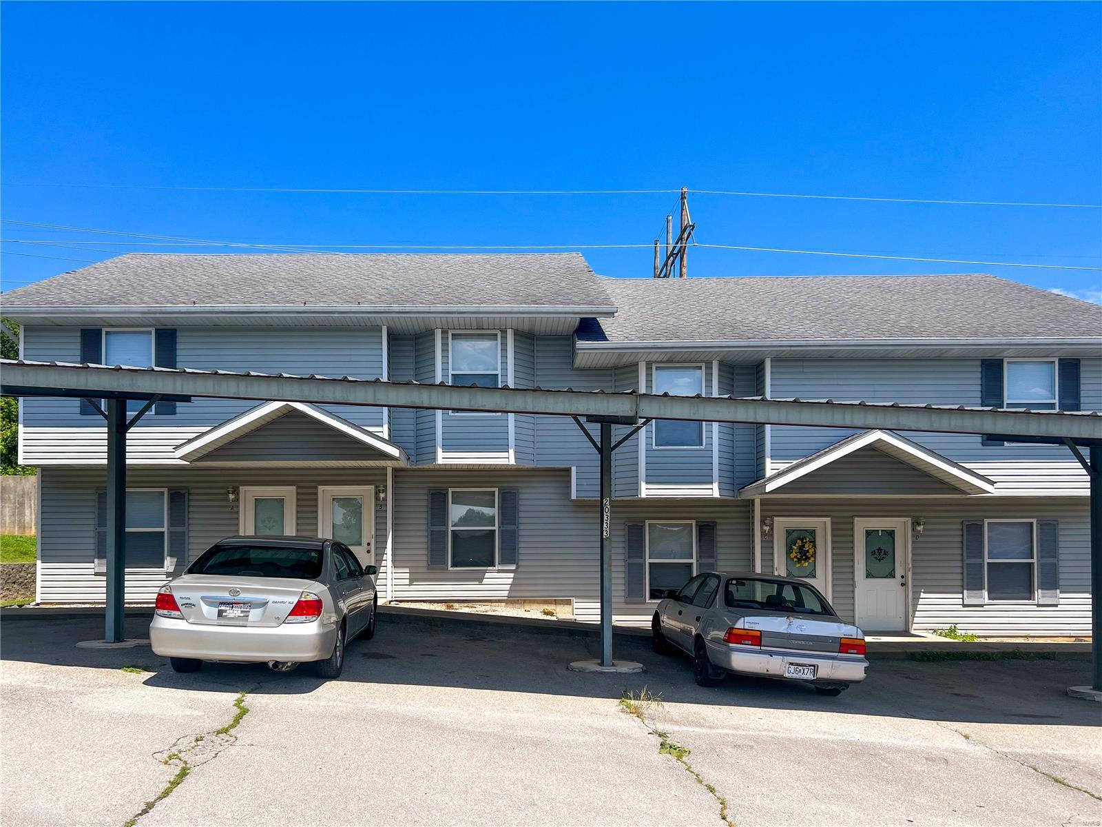 Seize the chance to invest in an exceptional property featuring 20 well-maintained townhome units across five buildings. Built in 2005, each unit offers a spacious 2-bedroom, 2.5-bath layout with modern amenities, making them highly desirable rentals. Kitchens are equipped with a stove, refrigerator, dishwasher, microwave, and disposal, with some units including a washer and dryer for added tenant appeal. All units provide central heating and air conditioning, along with covered parking areas, ensuring comfort and convenience. As an all-electric property, utility management is simplified with no gas bills. Rents range from $639 - $925 per month, promising steady returns. Situated on a 1.24 m/l acre lot within the sought-after Waynesville School District, the property boasts a strong rental history. This prime investment offers modern, well-maintained units in a desirable location, a solid portfolio addition.