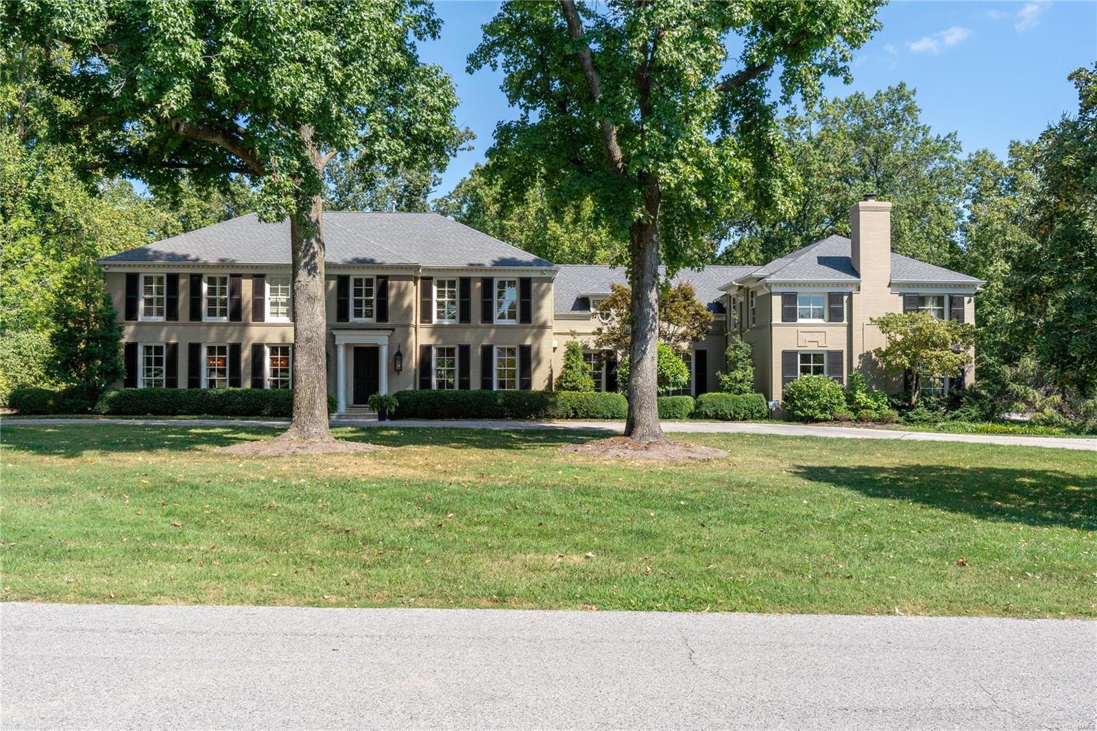 Old-world charm & modern amenities, expansive grounds, and luxurious features make this property a rare find. Over 1.5 acres of privacy, this home spans 6,815 sqft. Newer kitchen, with top-of-the-line appliances, custom cabinetry, and a cozy breakfast room overlooking the private lawn & pool. Separate LR, DR and Den. From the family room, enjoy the view of the pool and prof. landscaping. Main-floor laundry and a 4-car garage. The main staircase leads to 4 bedrms/3 updated baths. The primary suite features a luxurious bathrm w/high-end finishes & custom walk-in closet. 3 more bdms and 2 more full baths complete the 2nd flr. The back staircase provides access to a versatile suite, perfect for guests or as an in-law suite. This area includes an add/'t bedrm, full bath, & bonus room that could serve as a fitness room, a home office, or a 6th bedroom. Step outside into your private oasis, with the Pebble Tec pool, a beautiful spacious patio, landscape lighting, and much more. A must see!