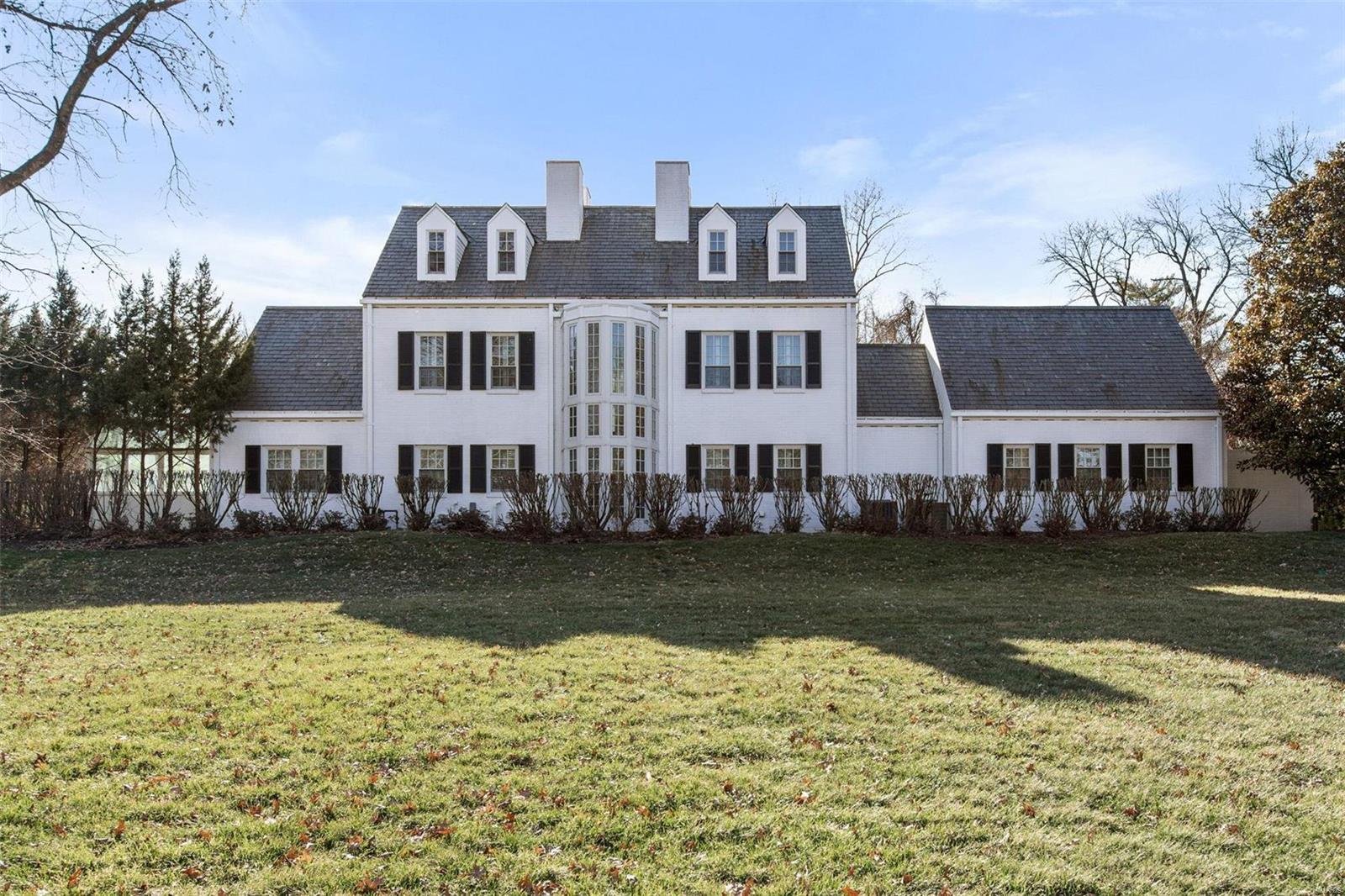 Classic elegance meets breathtaking modern design in this one-of-a-kind Ladue home. A stately traditional facade welcomes you, while inside, an architectural masterpiece by notable Boston architect James Crissman unfolds. Set on 1.6 acres of landscaped grounds, it’s both a private sanctuary & entertainer’s dream. Expansive windows & doors blend indoor-outdoor living, bathing the spaces in natural light. Soaring ceiling in Great rm w/ gorgeous views.  Newer open kitchen/breakfast rm/Fam RM. The main-level primary suite wing overlooks the pool & terrace with large bath & closet. 2 potential bedrms or den area. Upstairs, 3 ensuite bedrooms, offer comfort& privacy plus large office area.  Designed for entertaining, the main living space flow with wraparound terrace & pool. A stunning glass-enclosed sunrm, perfectly positioned off the pool. Spacious finished LL with rec area and plenty of storage. Every detail tells a story of architectural brilliance, refined living & harmony w/ nature. Additional Rooms: Sun Room