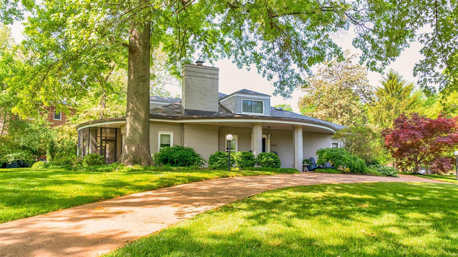 This California Style Contemporary home features a distinctive Palladian design w/ a Mid-Century interior. An interior renovation resulted in flowing floor plans & clean line finishes throughout the home. The main floor master suite is complete w/ quartz, double head shower & floating vanities. Keeping with the period, the formal LR & DR feature original floors & large windows that offer views of verdant landscaping. A massive quartz waterfall island anchors the eat-in kitchen that boasts Miele/Subzero appliances & brushed gold hardware, making this the kitchen everyone is looking for. One of 2 gas fireplaces is located in the family room that opens to a sleek back patio. A 2nd floor Rec room/5th Bdr. is a perfect hangout or exercise area. Oversized 2-car attached garage, large closets & generous attic storage. Conveiniently located across from Forest Park in the sought after Ellenwood Neighborhood is within walking distance to Wilson, Forsyth and St. Michaels Schools. Some Accessible Features