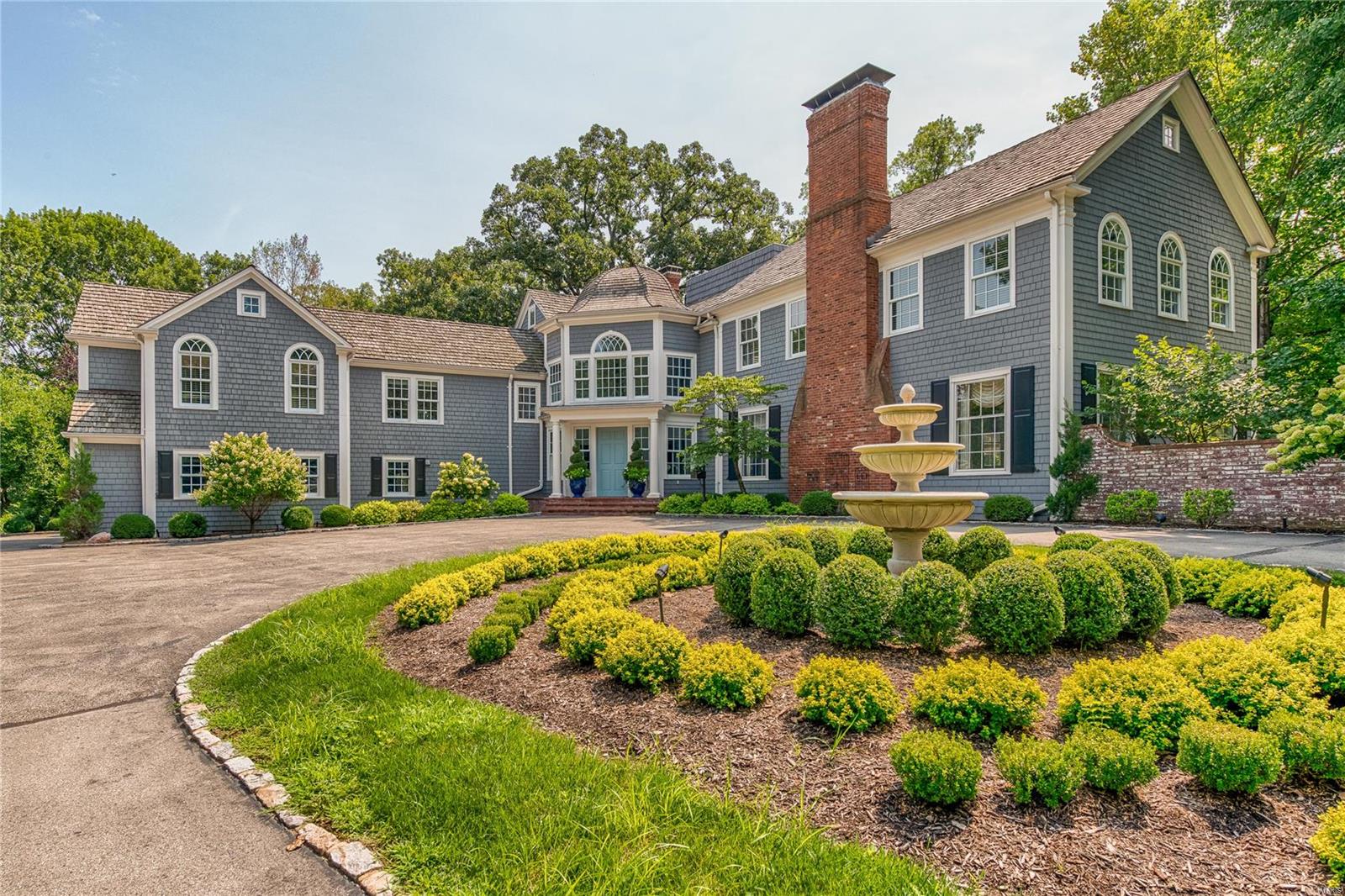 A Hampton-esque estate in Ladue on 3.04 acres. Very private at end of street. Grand center hall opens to rear terrace, fantastic living & dining rooms featuring stunning fireplaces & extensive mill-work & 10' ceilings. Kitchen w/ hardwood floors & granite counters features SubZero, Wolf, Kohler, KitchenAid appliances. Hearth/breakfast rm w/ built-ins & bow window walks out to deck overlooking side yard. Family rm with 14’ cathedral ceiling, arched windows, raised stone hearth, walks-out to: deck, covered rear terrace & yard. 2nd Floor: 9' ceiliings Master suite w/ office, bay window, fireplace, custom bath, 26’ x 10’ dressing rm & accessible 3rd floor seasonal closet. Bedrms 2 & 3 w/ en suite baths. Bonus sitting room accesses: laundry, bedrm 4 w/ en suite bath, bedrms 5 & 6 w/ Jack & Jill. Lower level: rec rm, wine cellar, arcade, full bath & storage. Grounds feature multiple brick terraces. Add'l features: Heated 4+ car garage, Sonos music system. 6 fireplaces Additional Rooms: Wine Cellar