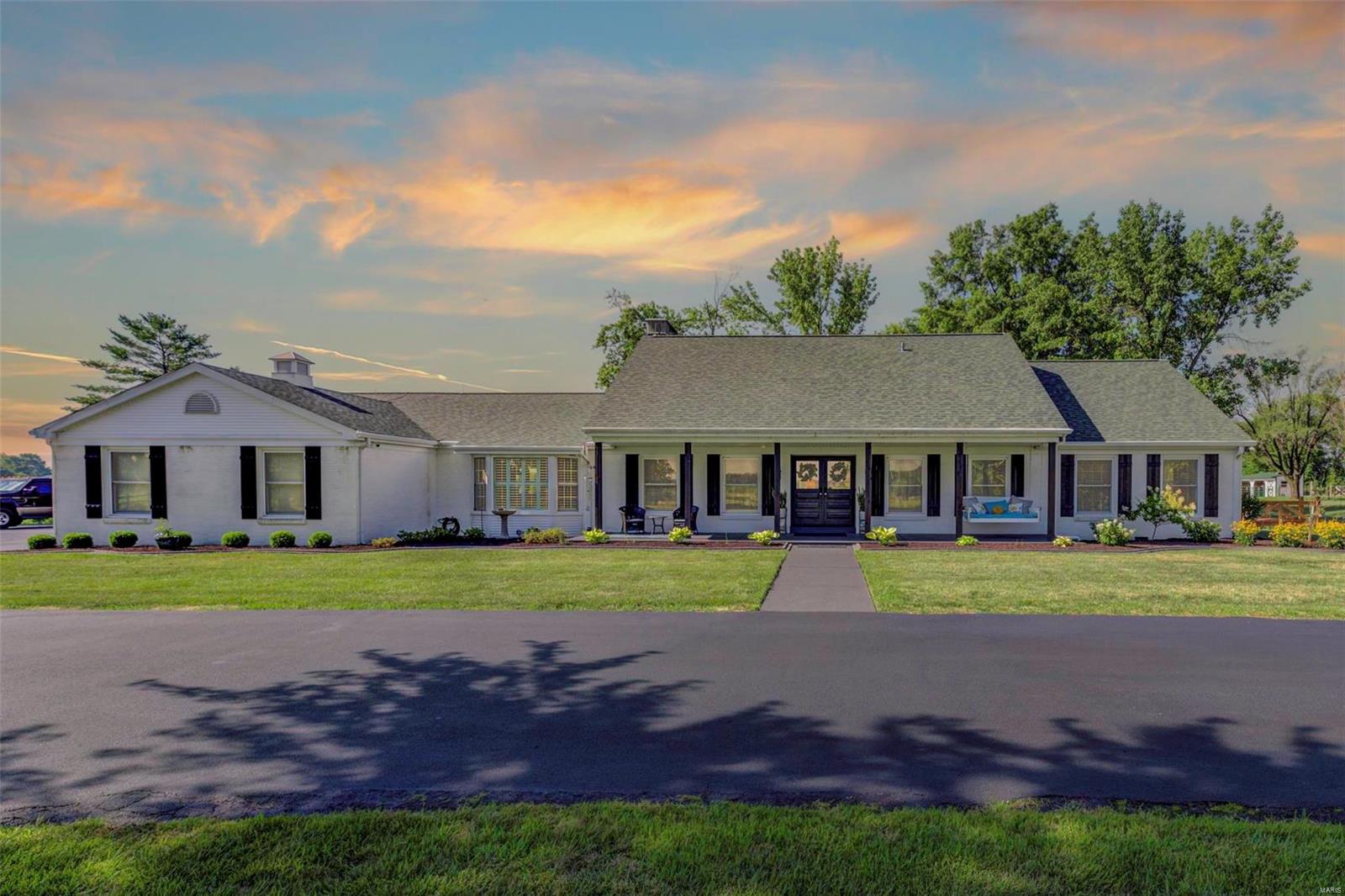 Come and see this magnificent home and horse farm on almost 13 acres. Over 4400 sq ft of beautifully & professionally renovated home. 4 sides Brick. Oversized garages for 4 cars and additional covered parking for all your toys. Run in shelter/barn with tack room. This beautiful home has all the high end finishes you are looking for. Open Concept living-ready to entertain. Stunning views of the property out every window!  Four seasons room, 2 full masonry fire places, Large Great room, Chef’s delight kitchen, Home office,  3 separate owner suites! The Master Spa bath that you’ve dreamed of!  Upstairs living quarters boasts-Bedroom, Sitting room with walk in closet & full bath. Waterfront on Shared 7-acre lake, loaded with fish. Dual HVAC & Water heaters. This is a very special property-Bring your horses! Unincorporated St. Charles County.  Perfect location to run your business from your home.  Don’t let it one slip past you!  Full list of Updates/Upgrades available. AHS 1 year Warranty Suitable for Bed/Brk