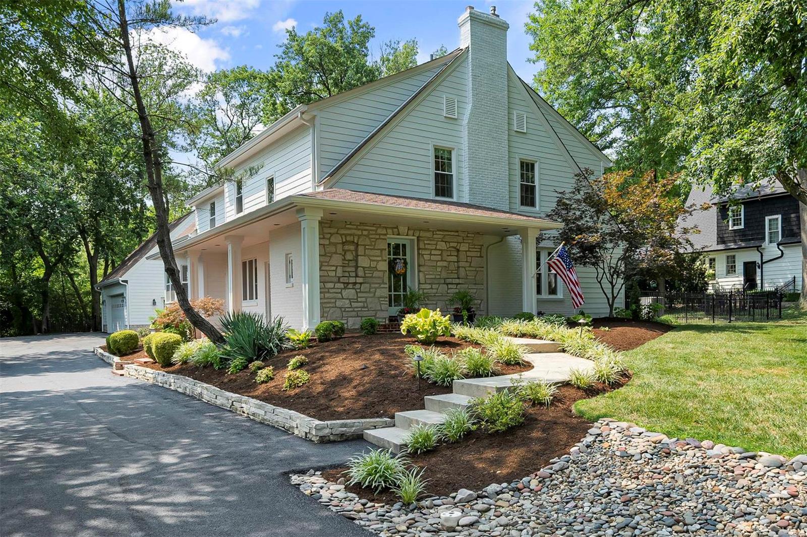 Nestled in the highly sought-after neighborhood of Ladue, this exquisite home boasts a crisp & freshly painted exterior, handsome brick pavers, new driveway, & features meticulously manicured landscaping. You’ll be greeted by a designer feel that includes stylish wallpaper, gorgeous lighting, & gleaming hardwood floors. Entertaining is a breeze in this well thought out home. The covered front & side porches provide inviting spaces for relaxation, while the open layout inside ensures ease of flow between rooms. The heart of the home is the spectacular kitchen, equipped with top-of-the-line appliances. Whether you’re hosting a dinner party or preparing a family meal, this kitchen is a chef’s dream. Upstairs the primary suite features an updated ensuite bath w/ soaking tub, double vanity, & private WC. Three additional bedrooms & two elegantly updated baths.
This Ladue gem combines luxury, comfort & timeless elegance--a true haven for those seeking the finest in residential living! Additional Rooms: Mud Room