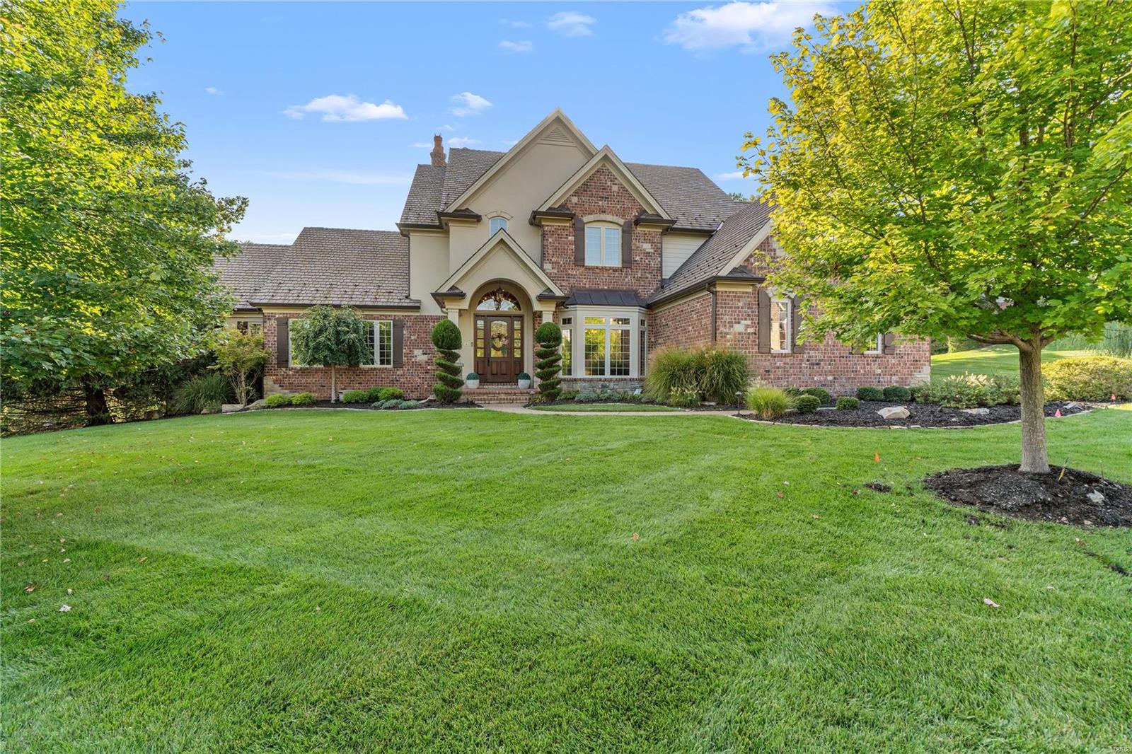 This absolute gem in St Albans boasts not only a beautiful private view of a pond nestled in the woods, but is highlighted w/antique beams from a Pennsylvania farm house. This lovely home has seen many extras added since the builder (who was the original owner) built the home for his family. Special features include three newer HVAC systems, two newer hot water tanks, updated Kitchen, Bar, Primary Bedroom & Bathroom remodel. New front door, new copper bay window, Kitchen pantry finishes, added cubbies & doors in laundry hall, newer dishwasher, ice maker, wine cooler, some shutters, finished primary bath closets, wine wall behind LL bar, Sonos system, built-in garage cabinetry, newer aggregate driveway & Inspire Roof. Landscaping is lush & includes a retaining wall that creates a manageable backyard & lower patio area w/view of the pond. There is no deck here to maintain, but rather a perfect patio featuring a fireplace right off the kitchen/hearth room that is perfect for entertaining!