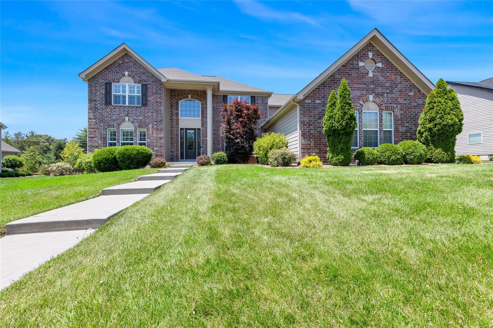 Welcome to 1085 Arbor Grove Court. This 5 bed, 4.5 bath residence greets you with stately curb appeal and an open concept floor plan with over 5,800 sq. ft. of refined living, tucked beautifully on a .556 acre lot. Step into the foyer, flanked by formal dining and study with built ins, perfect for remote work. Gleaming wood floors lead you to the great room with soaring ceilings and stacked stone fireplace, flowing seamlessly into the ample breakfast room and chef’s kitchen with custom cabinetry, SS appliances, stone counters and WI pantry. Inviting primary suite offers a luxury ensuite bath and oversized closet. Upstairs find 3 bedrooms, 2 full baths and upgraded media room - included in sale ($25k). Finished lower level includes a stunning wet bar, family room and gym, as well as a bedroom and full bath. Step out back to the picturesque covered outdoor living, featuring a stamped concrete patio, outdoor kitchen and generous fenced yard. Phenomenal location, approx. $350k in upgrades!