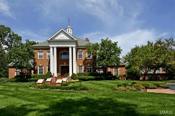 $100,000 PRICE REDUCTION!  Beautiful secluded 2.34 acre property on private cul de sac.  Over 10,000 sq.ft. of living space including walk out lower level.  Large gracious rooms.  Master suite with two baths, dressing area and adjoining study.  All baths updated.  Fabulous center island kitchen with Bosch, Subzero, Thermador, 2 dishwashers, butlers pantry and breakfast/hearth room with fireplace.  Adjoining 34' great room across rear of house with 12'ceiling height, fireplace, fabulous walk behind antique bar, bay window and French doors overlooking terrace and pool.  Four 2nd floor bedroom suites, 2 studies, finished walk out lower level, 4 fireplaces, three season room, pool, terrace, oversized 4-car garage and much more...