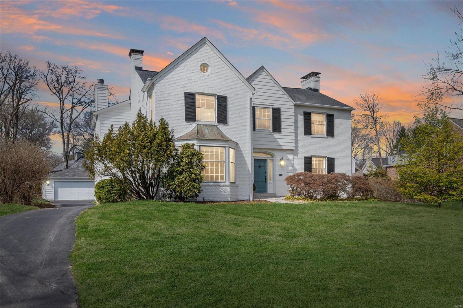 This 2Sty is a beautiful & spacious classic Kirkwood home w/plenty of character & charm. Situated on a cul-de-sac on one of Kirkwood’s most desirable streets this home boasts almost 3800SF of total living area. Elegant arched openings, hardwd flrs & crown moldings are found thruout. The inviting formal living rm & dining rm w/bay window are perfect for hosting dinner parties or other gatherings. The updated Kitchen is open to the Great Rm w/large gas fireplace & a 4 window bay plus an adjoining Breakfast Rm. French doors lead to the screened porch & patio overlooking the beautifully landscaped yard. The 2nd flr features a generous-sized Primary Suite w/2 walk-in closets & an additional laundry closet (washer/dryer included).The Primary Bath has a soaker tub, walk-in shower & double vanities. There are 3 additional Bedrms & a full Hall Bath. An elevator shaft was added off the kitchen up to the Primary Bedrm for a potential elevator addition. Walk to all Downtown Kirkwood has to offer.