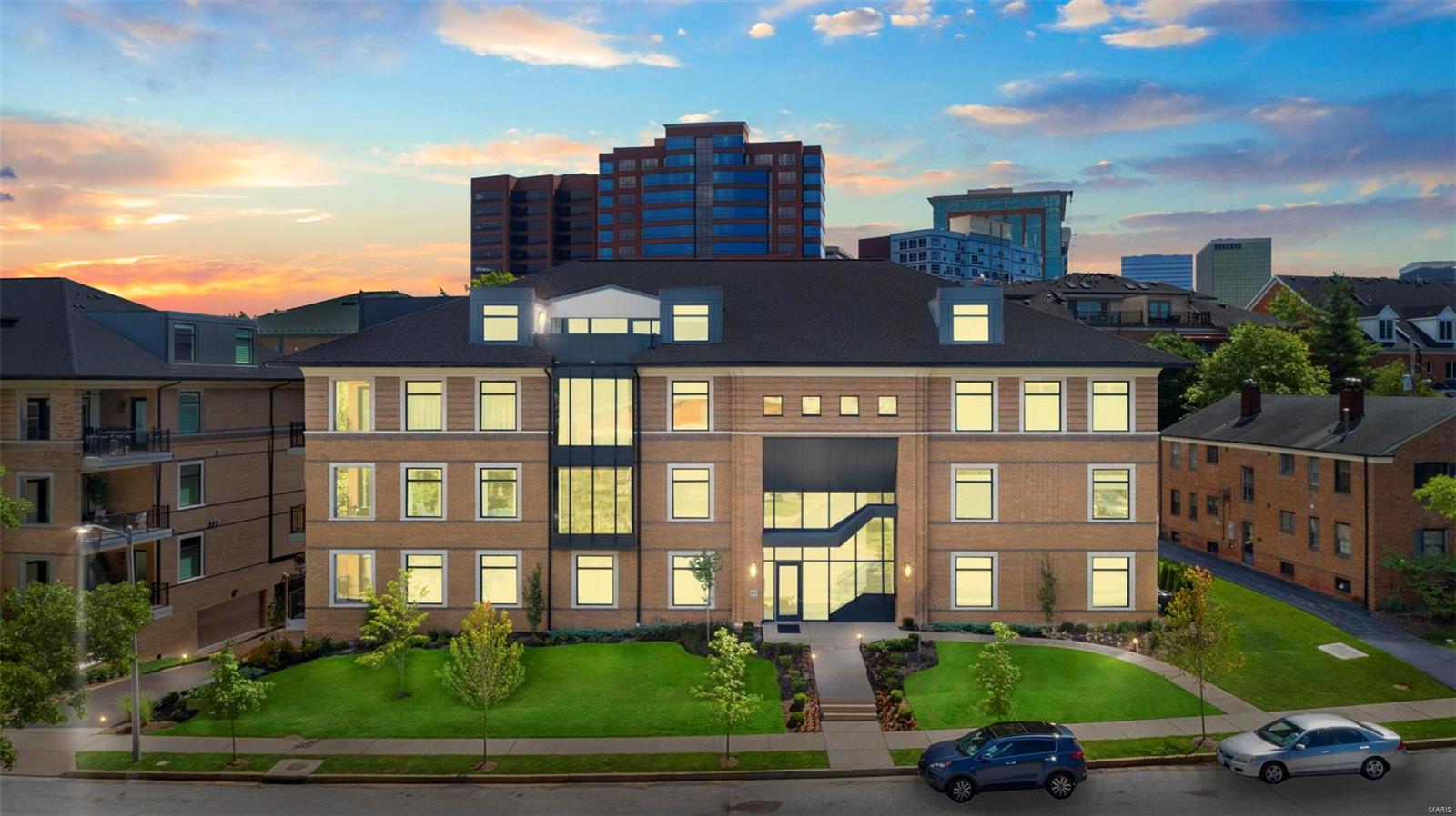 NEW PRICE! Extraordinary opportunity to own at Clayton's newest luxury condo development in over 10 years. Completed in Jan of '22, "The Pearl" sits on desirable Topton Way, just on the edge of downtown Clayton within eyesight of majestic Shaw Park and The Center of Clayton. Every feature was thought of in this expansive condo to allow for modern low-maintenance living. Open floorplan ideal for entertaining, 10' ceilings, 8' solid Masonite doors, wood flooring in main areas, custom draperies in lr and dr,  Hunter Douglas roman shades and sunshade, Closet Factory custom entry hall, primary bdrm and guest bdrm closets, gas fp with built-in bookcases, and Sonos Sound System. Enjoy the top-of-line kitchen with quartz counters, 42" SubZero fridge, 36" 5 burner Wolf Transitional cooktop, Zephyr range hood, and 30" Wolf Transitional double ovens. The large covered patio opens to both lr and bdrm with gas line for grill. Ample storage with a storage rm, spacious laundry rm, and bsmt locker. Location: City, Upper Level