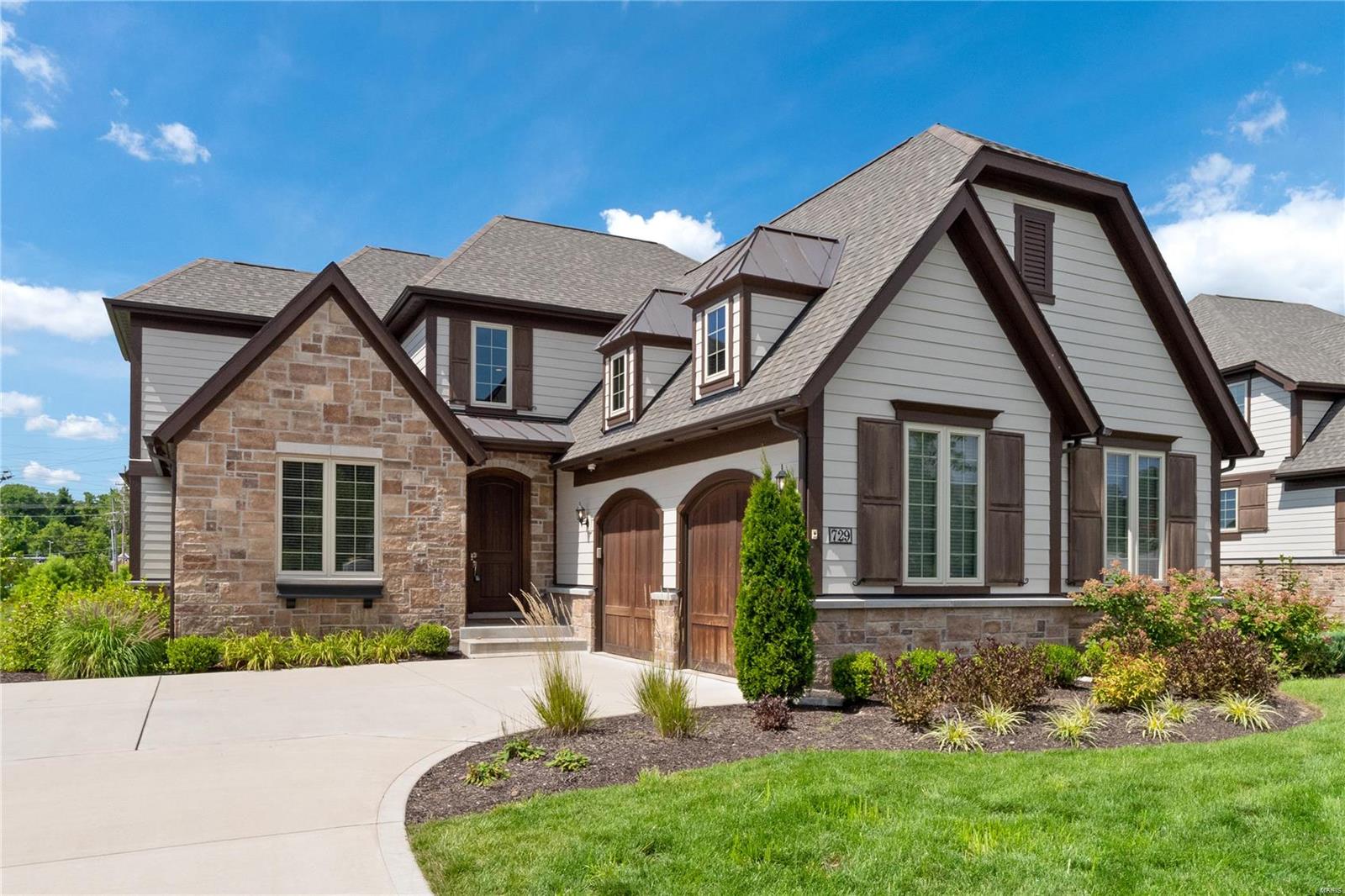 Built in 2017, this Ladue home is sure to impress! Greeted by a 2-story foyer you will immediately see the tasteful color choices, abundance of light and upgrades that provide an easy move-in-ready palate. Off the entryway you will find a first-floor office, dining room, mudroom and laundry room. Living room opens to a chef’s kitchen with custom cabinets, butler’s pantry, walk-in pantry and breakfast area. Private porch off the kitchen offers great space to relax or dine. First-floor master has coffered ceilings, two walk-in custom closets, double vanities, tub and an oversized luxurious shower. Two bedrooms upstairs share a Jack & Jill bath. An additional room on 2nd floor could be used as a bedroom, office, or playroom. Finished LL offers plenty of space to create your dream entertaining/living area with roughed in plumbing to add a wet bar. LL offers another bedroom, full bath & potential office or workout room. Oversized 2-car garage. This home will wow you! Additional Rooms: Mud Room