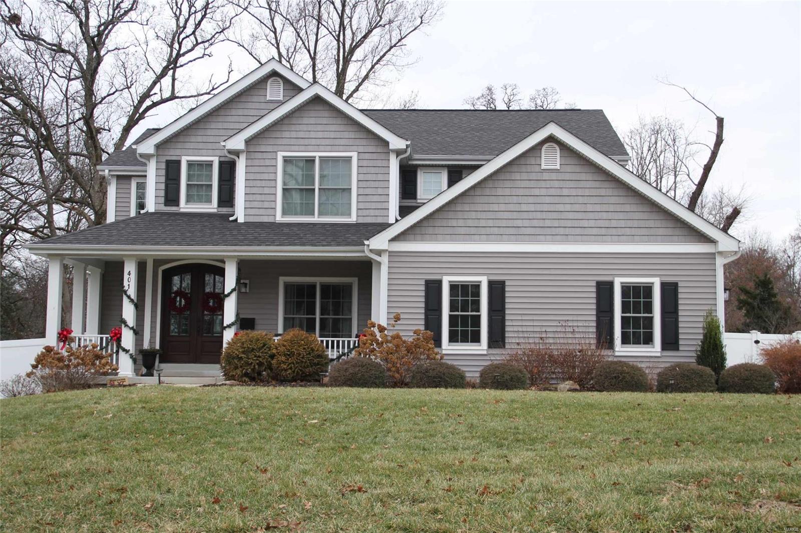 TBB- This is a RARE find!!A LARGE 95 ft wide lot w/a 2 story Lewis home featuring a Classic wrap around Front Porch w/2 car oversized Garage + 2 car detached Garage + finished LL.This 6 bdrm/5 full bath+1 half bath home has hardwood thruout the 1st floor. Gourmet Kitchen w/Huge island & Custom cabinetry+ Butlers pantry,Wainscoting in DR & Foyer,crown molding thruout the 1st floor.Projected Sunroom/Breakfast Room & 1st floor Office.9'LL pour, 9' 1st floor w/ample 8' 2nd floor.Master Bedroom has 10' tray ceiling w/crown molding.Master suite with sep tub & shower w/2 shower heads & dual vanities w/granite counters.Master closet by St. Louis Closet.3 Lg bedrms w/Jack n Jill bath & Ensuite Bath.1st floor guest Bedroom & Bath,Mudroom w/5 cubbies & lots of extra space,2nd floor Laundry w/slop sink & ceramic tile.LL finished w/Family rm,Full bath,Bedroom and Billiard room.Huge yard for entertaining or swimming pool.Vaulted Covered Porch. A few blocks walk to Downtown Kirkwood. Additional Rooms: Mud Room, Sun Room COOL: 14 SEER+