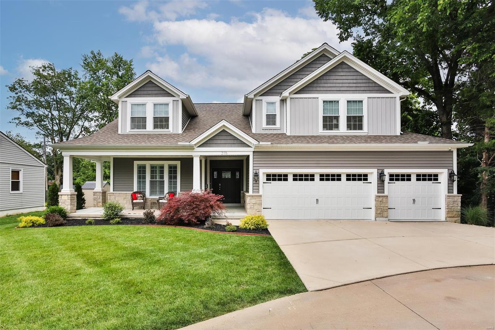 Just Listed! Perfect Kirkwood craftsman on a quiet cul-de-sac! Fantastic open floor plan with hardwoods throughout, spacious living room with gas fireplace, gorgeous kitchen with granite counters, stainless appliances, custom walk-in pantry, center island breakfast bar & dining room open to covered deck & patio - perfect for entertaining! French doors to fantastic den/office, powder room, main floor laundry with built-ins, plus spotless 3 car garage. Light & bright main floor primary suite with custom walk-in closet/dressing area & full bath with double vanity, soaking tub, custom tile shower & water closet. 3 more spacious bedrooms, plus 2 more full baths, deep pour lower level with finished rec room, tons of storage & potential to create even more living space with 4 egress windows & rough in plumbing. 6 years young, zoned HVAC, custom closets throughout, fully fenced yard, covered front porch, 3 car garage, plus all the convenience of downtown Kirkwood!