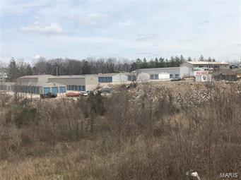 5.5 commercial acres with a thriving storage business. Approx. 36,000 sq ft of storage units. 4,800 sq ft bldg divided into 5 spaces currently a truck rental business. Room to expand. Tremendous opportunity, great cash flow. Appraised as of Nov. 2014 on file. SpecialListingConditions: Probate Location: City, Corner Location, High Traffic, Other, Suburban
