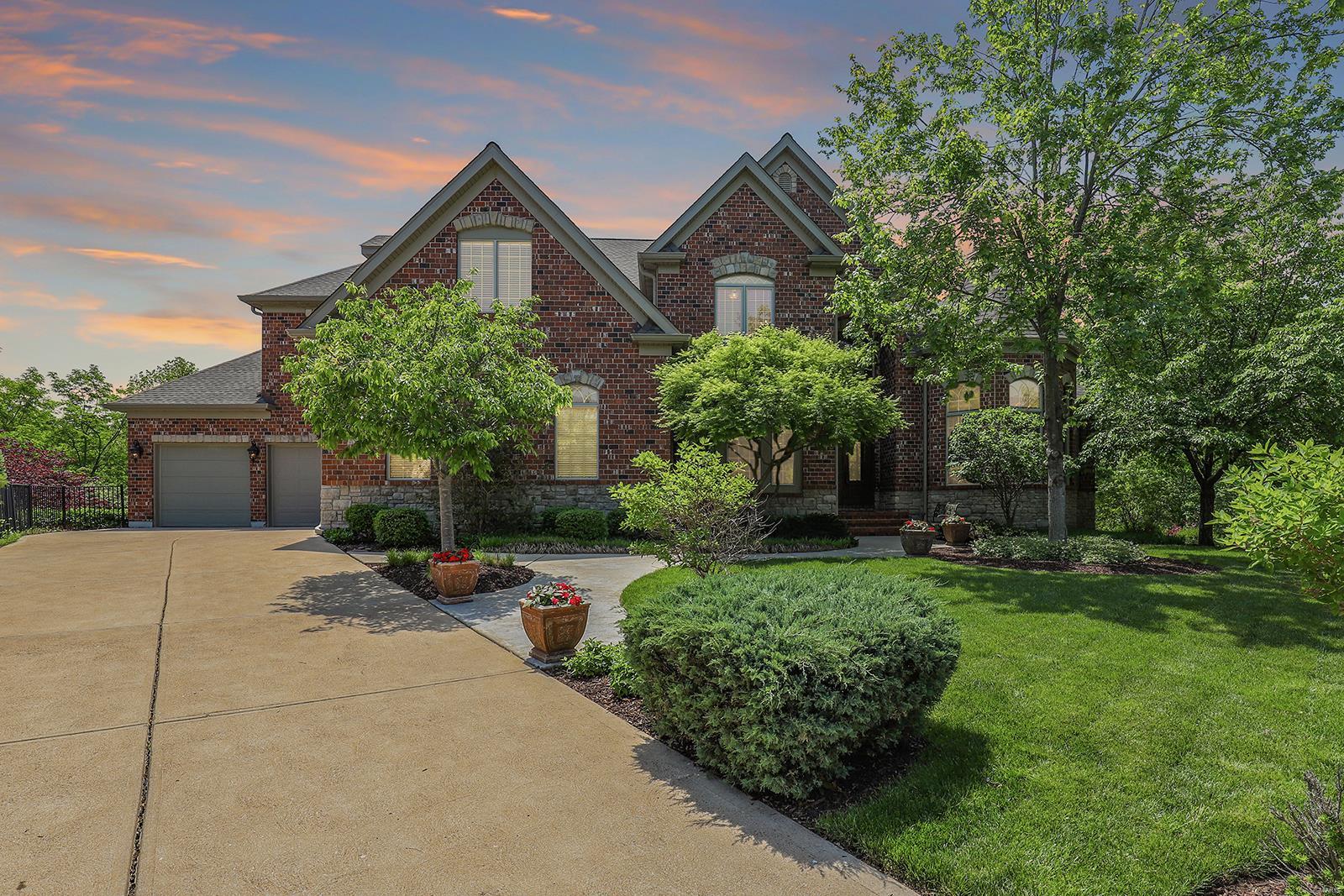 Spectacular, custom built 1.5 Story home with 7 Beds, 7 Baths (5F/2H) & nearly 10,000 sqft of living space with awesome Lower Level! Gourmet Kitchen with custom cabinets, granite, island, breakfast bar, walk-in pantry, Butler’s Pantry & Breakfast Room! Light filled Hearth Room with floor to ceiling stone see-through fireplace.  Spacious Master Retreat with luxury Bath, jetted tub, stand-alone shower & custom walk-in closet with laundry hookup! 2nd Floor features Loft, 5 Beds, 2 en-suite, while 2 others share a Jack & Jill Bath, Bonus Room & 2nd Floor Laundry. Walkout Lower Level is amazing, multiple entertaining areas, custom wet bar, gas fireplace with stone surround & Fitness Room. Relax outside in your private oasis! Upper deck with see-through stone fireplace, covered patio complete with outdoor bar/kitchen with granite counters & SS appliances! Beautiful paver patio with incredible stone fireplace & fabulous in-ground pool! Great location!