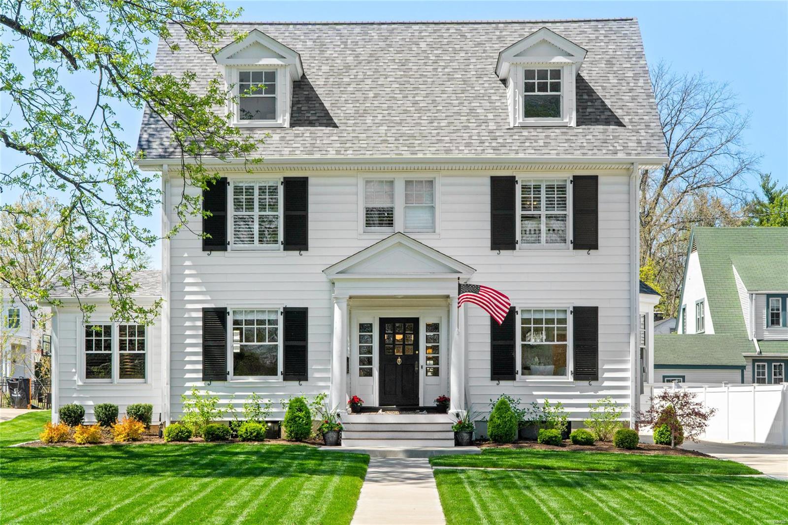 Timeless Kirkwood Home in Prime Walkable location. A seamless blend of old world character & quality new construction.  Extensive renovation/addition in 2022-2023. Historic elements remain like pocket doors & stain glass window. Custom craftsmanship in the wainscoting, hardware, & crown molding. White Oak floors throughout. Entry flanked by living Rm w/ FP & private office. Sep dining Rm w/ bay window connects to wet bar area w/ add’l fridge. DREAM Custom Kitchen w/ center island featuring Quartzite tops.  White ILVE Italian Eight Burner Stove! Built in high end appliances & glass inlay cabinets. Fam Room w/ built in bookshelves & Gas FP. Covered rear patio w/ Traeger Grill, heater, & TV. Primary Suite w/ Vaulted, Wood plank Ceilings & Recessed lights. His & Her Closets.  Primary Bath w/ dual vanity, stand alone tub, & glass shower. 3 other beds for the family. 2nd bath w/ 2 sinks. 2nd floor Laundry.  Fully heated/cooled 3rd floor Rec Room. Detached 2 car garage.  CLASSIC Kirkwood!