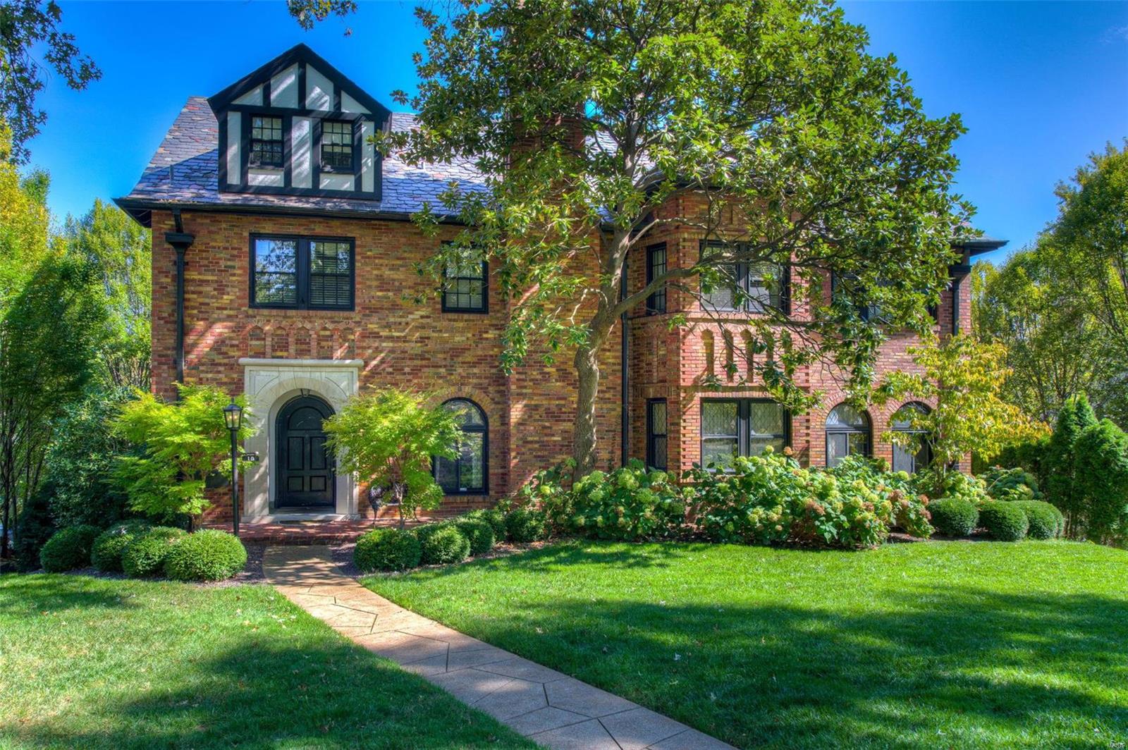 Located in the prestigious and historic Claverach Park neighborhood, the curb appeal of this impressive home is unsurpassed with its beautiful landscaping and unique masonry brickwork design. Outstanding architectural features include an arched front door, spacious entry hall w/terrazzo floor, winding staircase, diamond leaded & stained glass windows, large open archways, bay windows, French doors, & charming arched built-in shelves. The spacious light-filled interior & wonderful flow of rooms creates a terrific home for entertaining. The first floor includes a large living room, lovely formal dining room, family room, sun room, half bath, and a huge kitchen/hearth room addition. 4BR's, including a master suite, 2 baths,and a sitting room/office on the 2nd floor. 3rd floor has 2 more bedrooms and a full bath. 3 car garage. Your private outdoor oasis includes a huge deck w/BBQ grill,gorgeous inground heated pool w/large pool deck,and a delightful brick paver patio. A truly special home. Additional Rooms: Sun Room
