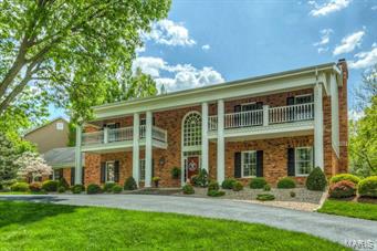 Spectacular 2-Sty Southern Colonial situated on parklike .75 acre grounds! Impressive front porch entrance highlighted by architectural columns leads to elegant 2-sty hardwood foyer, formal living & dining rooms with elaborate millwork & library-paneled family room with brick fireplace flanked by built-in bookcases & granite wet bar.  Fabulous updated kitchen features granite countertops, professional quality appliances & center island with breakfast bar. Adjoining breakfast room with bay window, vaulted sunroom & delightful sun porch provide a welcoming gathering place. Sumptuous master bedroom suite with 2 walk-in closets & luxury bath with Jacuzzi offers an appealing retreat. 3 Additional bedrooms & 2 full baths complete the 2nd floor living quarters. Walk-out Lower Level includes huge recreation room with wet bar & family room with fireplace, built-in bookcases & French doors to patio plus guest suite. Gorgeous tree-lined lot with deck, patio, pool, circular drive & 3-car garage. Additional Rooms: Sun Room
