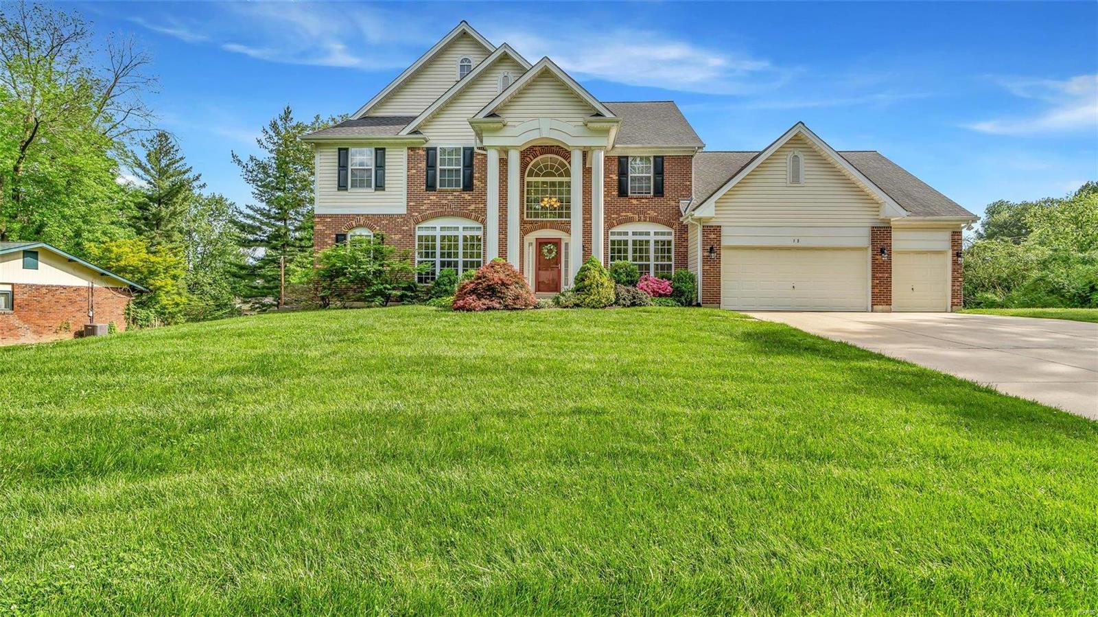 Beautiful 1.5 Story Home in the much desired Ladue School District has so much to offer! Step inside the 2 story entry foyer & you are greeted with hardwood flooring & arched entryways! An office to your left & a formal dining room to your right provide for excellent living space! The great room offers tons of natural lighting with a wall of windows as well as gas fireplace & spacious open floorplan. The kitchen features custom cabinetry, granite counters, new tile backsplash, stainless steel appliances & an adjoining breakfast room with convenient access to the composite deck overlooking the private backyard. The main floor master has walk in closet & luxury bath with double sink, shower & soaking tub! Upstairs you will find 3 additional large bedrooms, each with their own private bath & a loft area! Additional amenities include: finished walk out lower level with theater room, family room, bedroom & custom wet bar! This home also has new HVAC, 2 new water heaters & main floor laundry