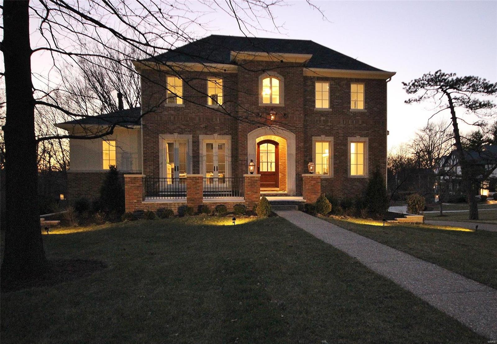 Just Fininshed! Fantastic 1.5 story. Enjoy the private feel of being located on almost .6 of an acre. Beautiful brick & stone exterior. 10' ceilings, hardwood floors, 3 fireplaces, 3 zone HVAC, 2 wet bars.  Ship lap in foyer, breakfast & stairwell. Custom kitchen with huge center island & bar seating, 48" wolf commercial range, subzero fridge, beverage center & ice maker. 3 sets of double doors open to outdoor living with 14x14 covered deck & 20x18 open deck with fireplace. Huge master with coffered ceiling & fantastic 21'X11' bath with 2nd laundry, 2 custom vanities, walk in shower, large custom closet. 3 bedrooms up with coffered ceilings, private baths & walk in closets, loft/sitting area + Laundry room with custom cabinets. Beautiful lower level with a huge family room with hardwood, custom wet bar, & a huge bedroom with adjacent bath & walk in closet. 38'X22' 4 car tandem heated garage. prof landscaped in ground sprinklers. 25X11 Cut stone front veranda. Walk to downtown Clayton!