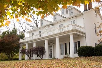 Own a part of Washington History!  This federal style home built by Dr. Elijah McLean overlooks the Missouri river with a lighted cupola on the 3rd floor.  Most recently, this building was used as a fine dining restaurant with living quarters on the third floor.  Over 11,000 sq feet includes a formal dining room, multiple banquet rooms, side patio for outside entertaining, 4 fireplaces, and a commercial grade kitchen with 4 walk in coolers and all stainless steel appliances and prep tables.  This property includes almost a full basement with a wine cellar and walk in cooler.  With just minutes away from St. Louis, this home has endless business possibilities only limited by your imagination.   Whether entertaining, hosting corporate gatherings, elegant wedding ceremonies, or other special events, this property provides everything you would need to make it a memorable event and a prosperous business.  Located in the heart of wine country.  Imagine the possibilities! Location: City, Downtown, High Traffic