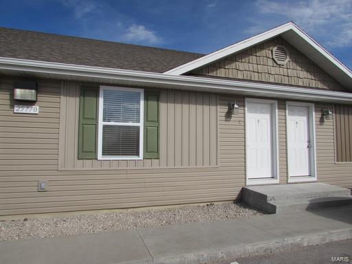 Don't miss your chance at this amazing investment property. New in 2011, this 14 unit building with 12,944 sq ft m/l total living space features large 1 bedroom and 1 bathroom units.  All units are fully furnished with stove, refrigerator, dishwasher, microwave, washer & dryer, king size bed, night stand, dresser with mirror, sectional sofa, coffee table, 2 bar stools, built in desk with chair, and flat screen tv and currently rent at $795/month. Lots of parking space for tenants and guests. You will not find a better constructed or maintained building. This property has sprinkler system installed, and has a great storage room for maintenance items. Situated on 4.21 acres m/l could leave room for additional buildings. Amazing rent history. Located just off I44 only minutes from Fort Leonard Wood this is a perfect location.  At the time of listing this property is fully occupied.  Call office for more information. Showings require at least 24 hour notice.