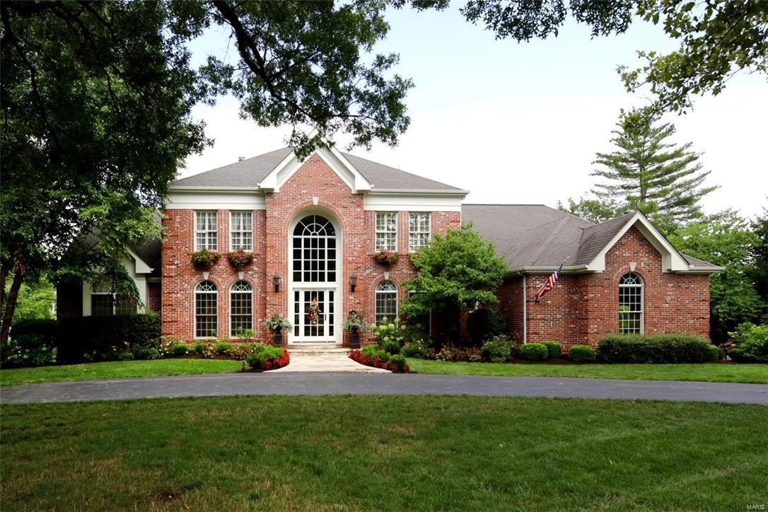 Be prepared! This is one of the most unique & creative homes available! Very liveable,great for everyday family life & what fun for entertaining! Step inside--formal dining rm to the right,beautiful paneled office to the left & straight back the 2 story greatroom w/builtin bar & stone fireplace--the center of the 1st flr,but just the beginning of the very special spaces. Every direction you turn is delightful. There is a desireable 1st flr mastersuite w/high ceilings, interesting finishes & gorgeous bath, a wonderful 2 story kitchen/hearth & breakfast room & an inviting wine room.  A front circular staircase as well as a back staircase lead to the 2nd flr & its 4 additional bedrooms & 3 full baths. One of the highlights of the 1st floor is the very large screened porch that overlooks the extraordinary pool, putting green,& play areas.Don't miss the very large finished LL with its builtin play house, batting cage, basketball hoop & exercise rm.It too walks out to the wonderful backyard!