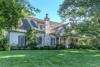 You will fall in love with this custom Hennessey-built 9 year old Ladue home. With 4 bedrooms, 3 full baths, 2 half baths & over 4,800 square feet of living space, this home speaks to today's luxury buyer. Find many unique finishes, including some Old World European hand finishes & wide plank floor. The brick exterior incorporates a hand, whitewashed finish, extensive stone work, real board & batten shutters & wrought iron hardware. Inside, find a 2-story entry with limestone floors & a formal Living Room with a wood-burning fireplace. The Great Room features a vaulted ceiling with exposed beams & a stone wood-burning fireplace. The open kitchen has an oversized island, granite counters, custom cabinets & a 6-burner gas stove. Laundry room off of kitchen. The main floor master suite has high ceilings, 2 walk-in closets & a luxurious bath with an indoor & outdoor shower! There are 3 bedrooms upstairs with 2 full baths plus a loft space. Recreation room above the 3-car garage. Additional Rooms: Mud Room