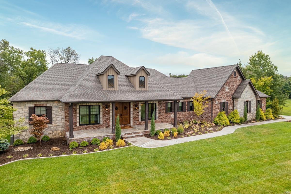 Stunning custom-built home nestled on 6 ac of resort-style living! You have to SEE in person to appreciate the level of updates that have been completed. The seller has spared no expense throughout this 4,235 sf home that was redesigned by Savvy and renovated by Markway. Updates & upgrades to the home include complete kitchen redesign w/ Cambria countertops throughout, foyer completely redone with new tile, dining room redesigned, fireplace designed & redone w/ built-ins, all new lighting & chandeliers throughout, high-end drapery by Sunshine Drapery, new blinds, closets designed & created by Closet Factory, entire wet bar redone, ultimate master bath & HUGE walk-in closet, two master suites on the main level, fresh paint throughout. Lower level finished with library & coffee bar, office, & bed/bath.