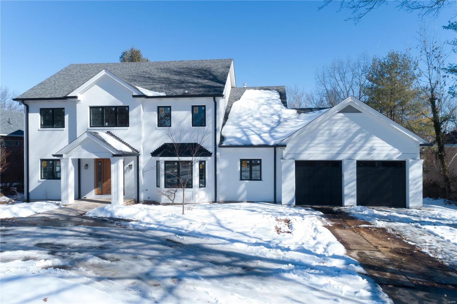Another Custom Home Renovation by Dominion Homes in the heart of Ladue. This builder's meticulous attention to details shows throughout this major renovation. Both the exterior structure & Interior space have undergone a full reconfiguration that's guaranteed to impress. This 4 bed/4.5 bath home has a newly completed walk-out basement featuring a rec. room/living room space, full bath & a wet bar equipped with a wine refrigerator. The extensively renovated main level features a designer master suite, a gourmet kitchen w/ top of the line quartz countertops & SS appliances including a built-in 42" Refrigerator. The 3 additional bedrooms on the 2nd floor are of generous size w/ 1 en-suite bedroom & a Jack n Jill. The home features all new energy efficient windows. There's special millwork throughout the home & a beautifully reconstructed deck that wraps around the back of the home overlooking the private yard.