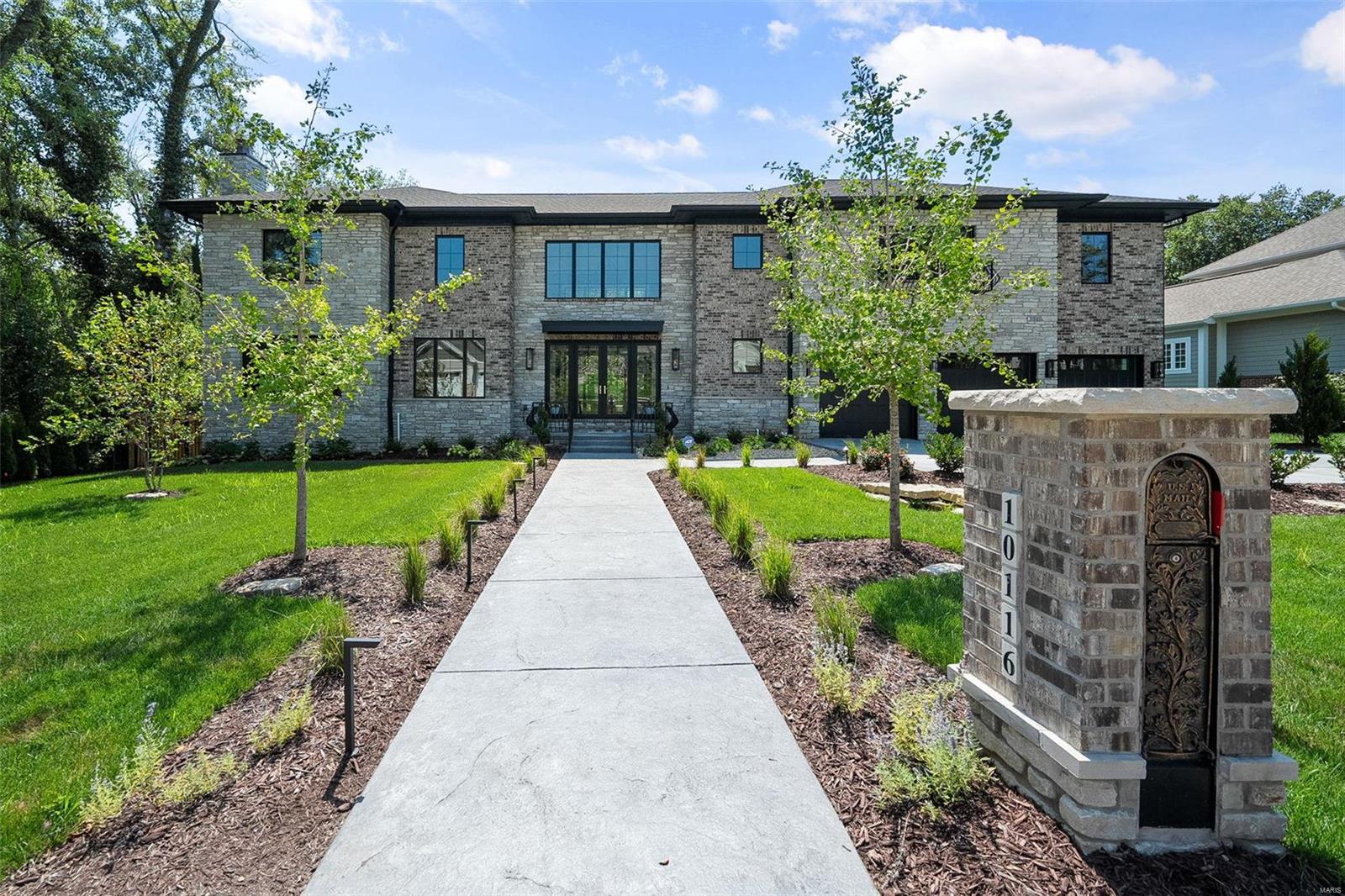 Another new construction home done by HGTV known Chambers Development is in a class of its own! This 7,551 SF entertainers paradise is walking distance to Ladue/Frontenac downtown shopping & highly rated Ladue school districts. Custom made millwork greets you every turn! Great room boast a 25ft cloister vault ceiling & scenic view through 9ft glass sliders into a grand backyard. The dream kitchen has custom cabinetry, 10ft quartz island, leathered countertops, glass wine cellar & luxury appliances. Family & formal dining room have custom trim, ceilings & fireplaces. The main suite has coffered ceiling, fireplace & designer closets. Main bath is a oasis w marble like porcelain tile, automated shower & double vanity. Upstairs has endless space to relax w another main suite, 3 ensuites, 1 bed, guest bath, & media room. Finished basement has 2 living rooms, bar, movie room, bourbon cellar, bath, & gym. Exterior has 3 car heated garage w electric car utility, camera security, & irrigation.