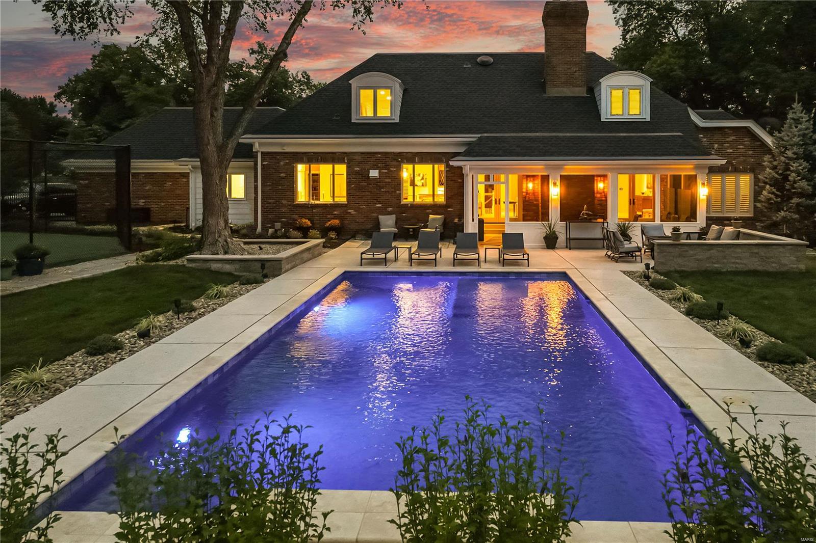 Exceptional 1.5 story home by custom builder, Higginbotham, featuring an all new sophisticated Gunite saltwater pool w/waterfall, 12ft tanning ledge/bench surrounded by privacy/landscaping & fencing. Plenty of green space for backyard fun PLUS your own pickleball/tennis court! Relax by the pool, patio w/fire pit or sit back in the screened porch. The completely newly designed LL awaits you with a custom wet bar, quartz counters, wine cooler, dishwasher, floating shelves & tuscan tile work. Also features all new rec room, theater room w/7 person theater seating, 88in Sony 5k big screen tv. In addition, a full bathroom, workout room, workshop & a walk up. Entering the 2-story foyer you are welcomed with hardwood flooring w/an open floor plan featuring a custom bar perfect for entertaining, main floor primary bedroom w/possible office/bedroom. 2nd floor features an en suite bedroom w/walk-in closet & 2 addtl bedrms & full bath. Your oasis awaits-walk to parks, Straubs, restaurants & more! Additional Rooms: Sun Room