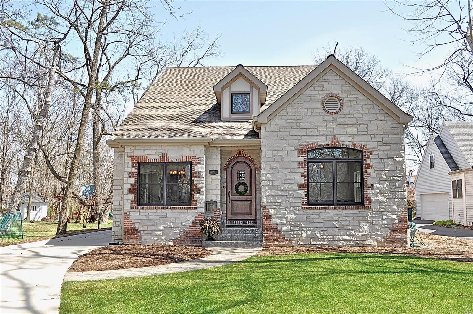 Spectacular, nearly new custom-built home, with all of the bells and whistles, presents a rare opportunity.  Special features include; two-story great room with brick and stone fireplace, gorgeous kitchen with eleven foot island of unpolished granite, Wolf stainless appliances, a butler’s pantry, vaulted ceilings in master bedroom with large custom closet and travertine stone bath.  The scraped oak hardwood flooring, custom cabinets, and wrought iron railings throughout, make for a classic feel. The private back patio off of the great room makes it a natural space for entertaining. There is an oversized three-car garage at the back of a gorgeous, large yard, just two blocks from downtown Kirkwood. Please see attached features document for a full list of details on the construction.